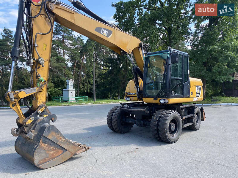 Колесный экскаватор Caterpillar 313 2014 в Харькове