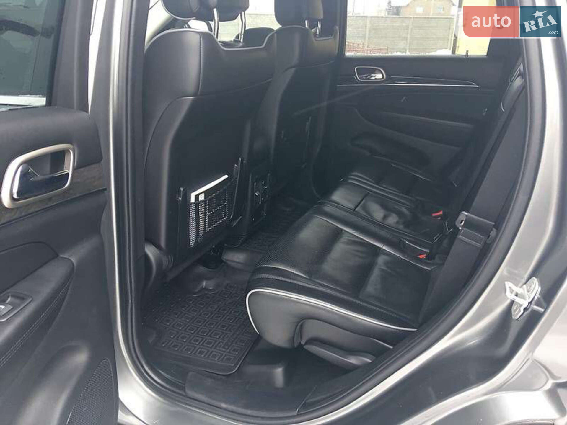 Jeep Grand Cherokee 2011 VIN 1C4RJFCM5CC100880 фото оголошення 2 з 19