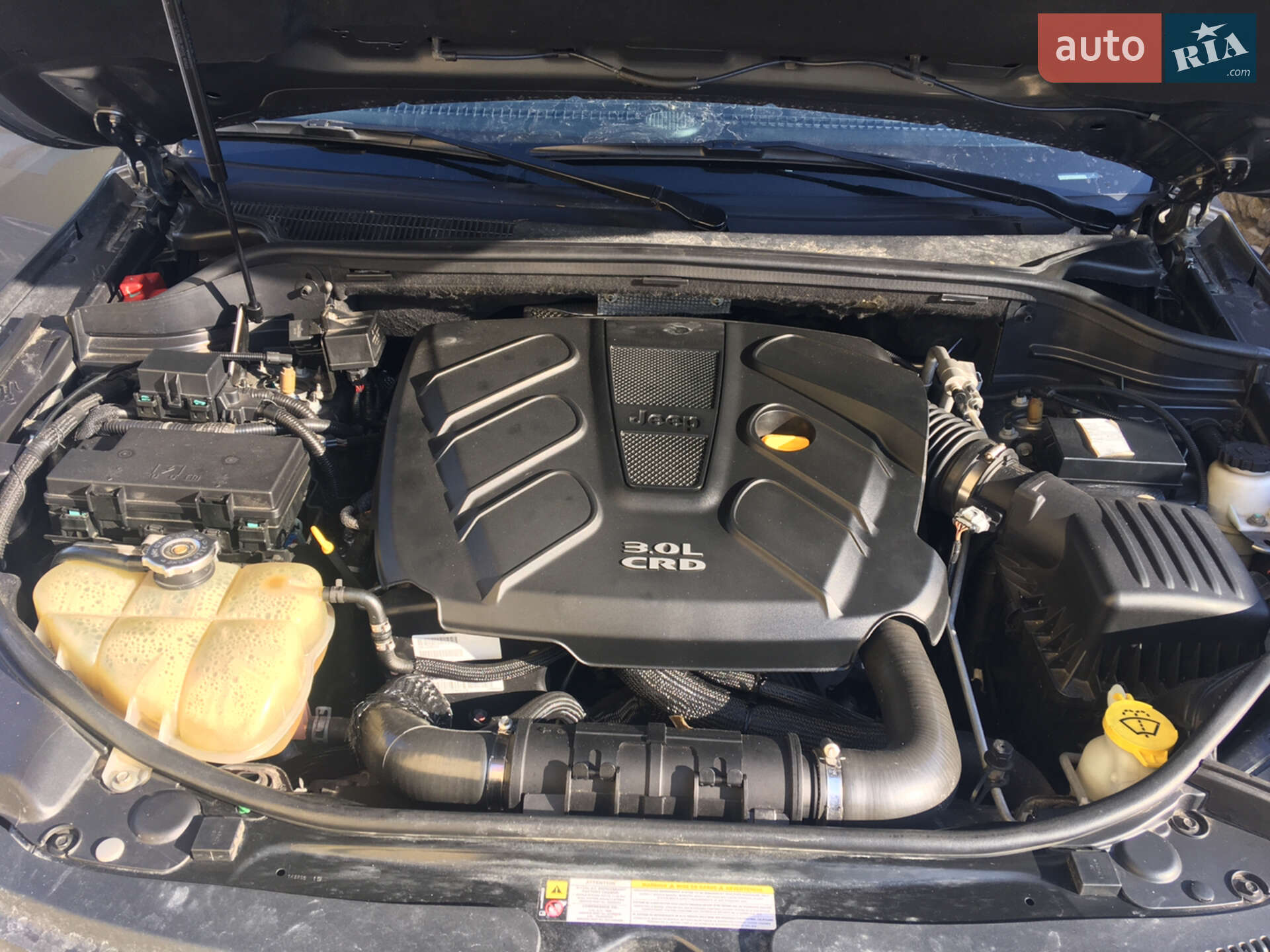 Jeep Grand Cherokee 2011 VIN 1C4RJFCM5CC100880 фото оголошення 2 з 22