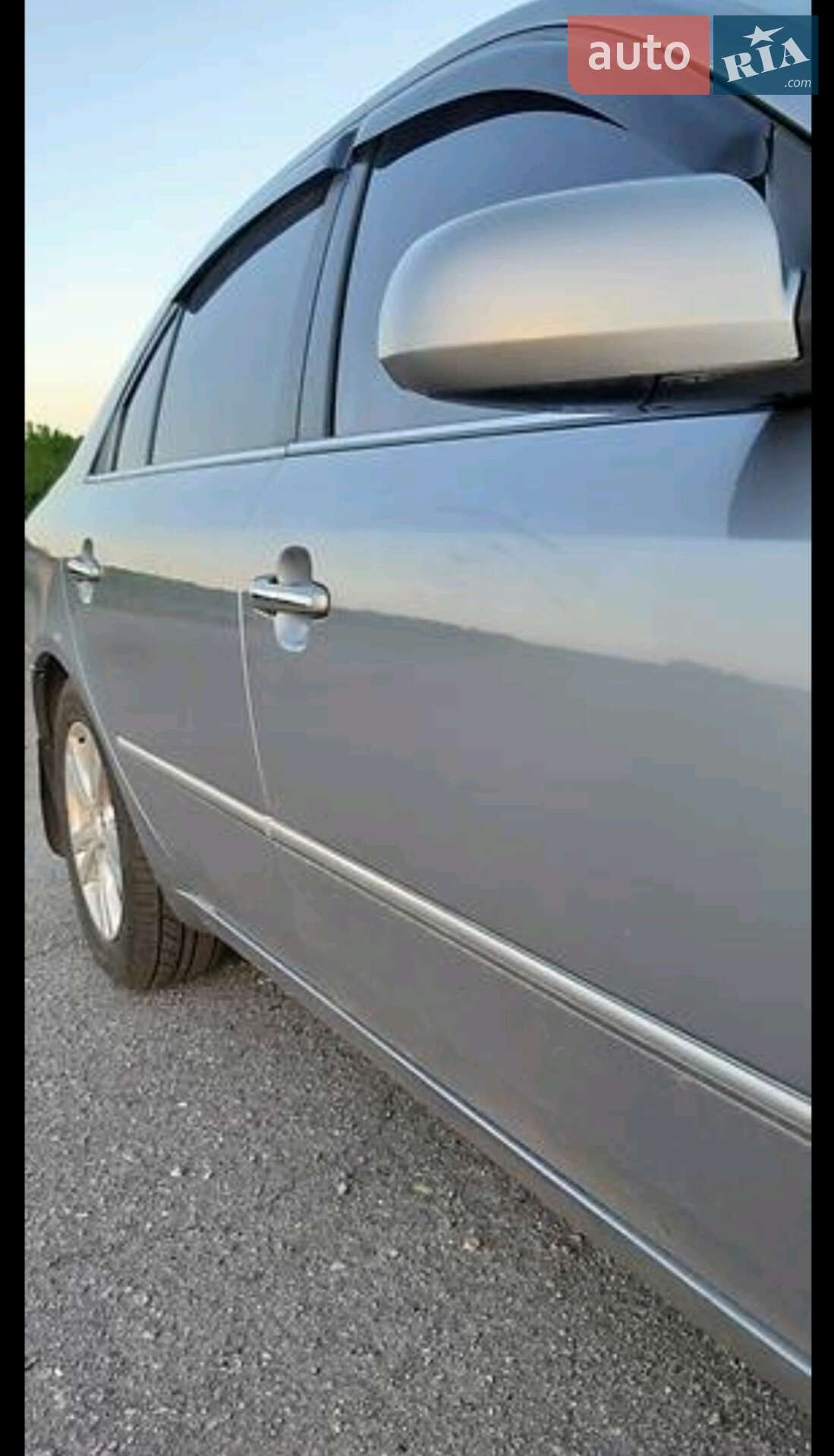 Hyundai Sonata 2009 VIN KMHEU41AP9A605243 фото оголошення 14 з 20