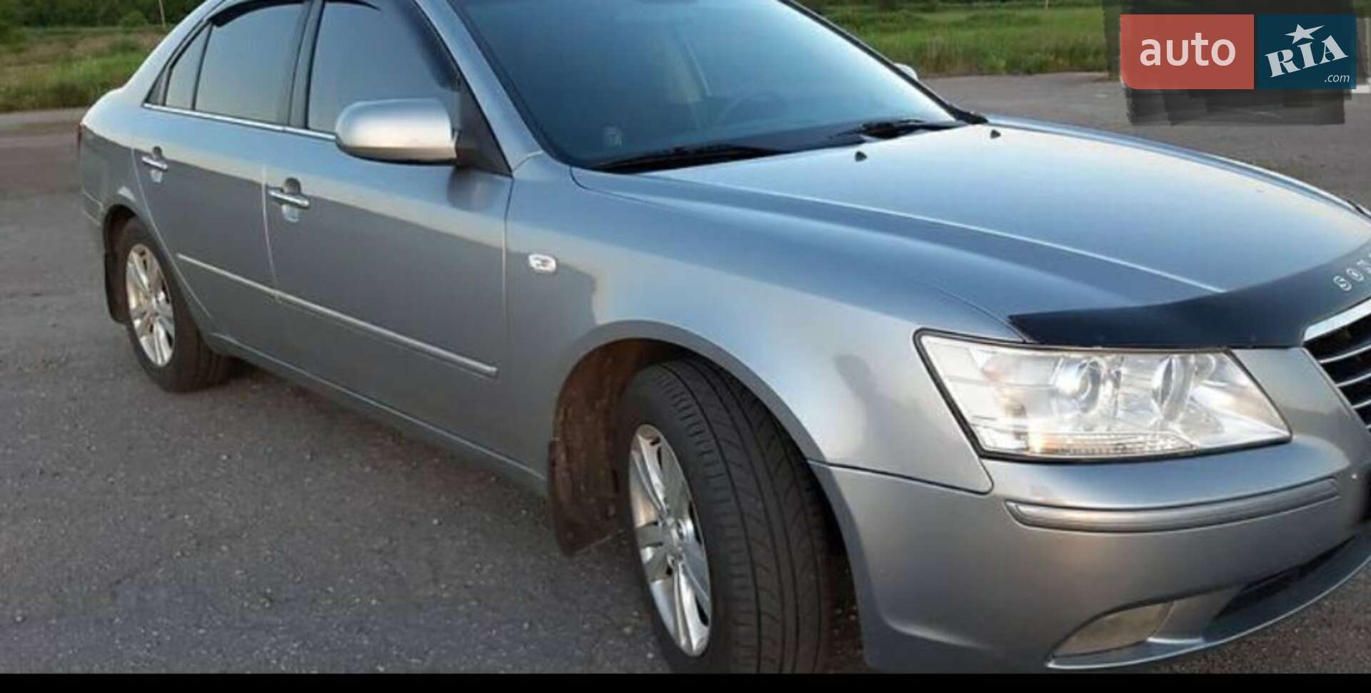 Hyundai Sonata 2009 VIN KMHEU41AP9A605243 фото оголошення 7 з 20