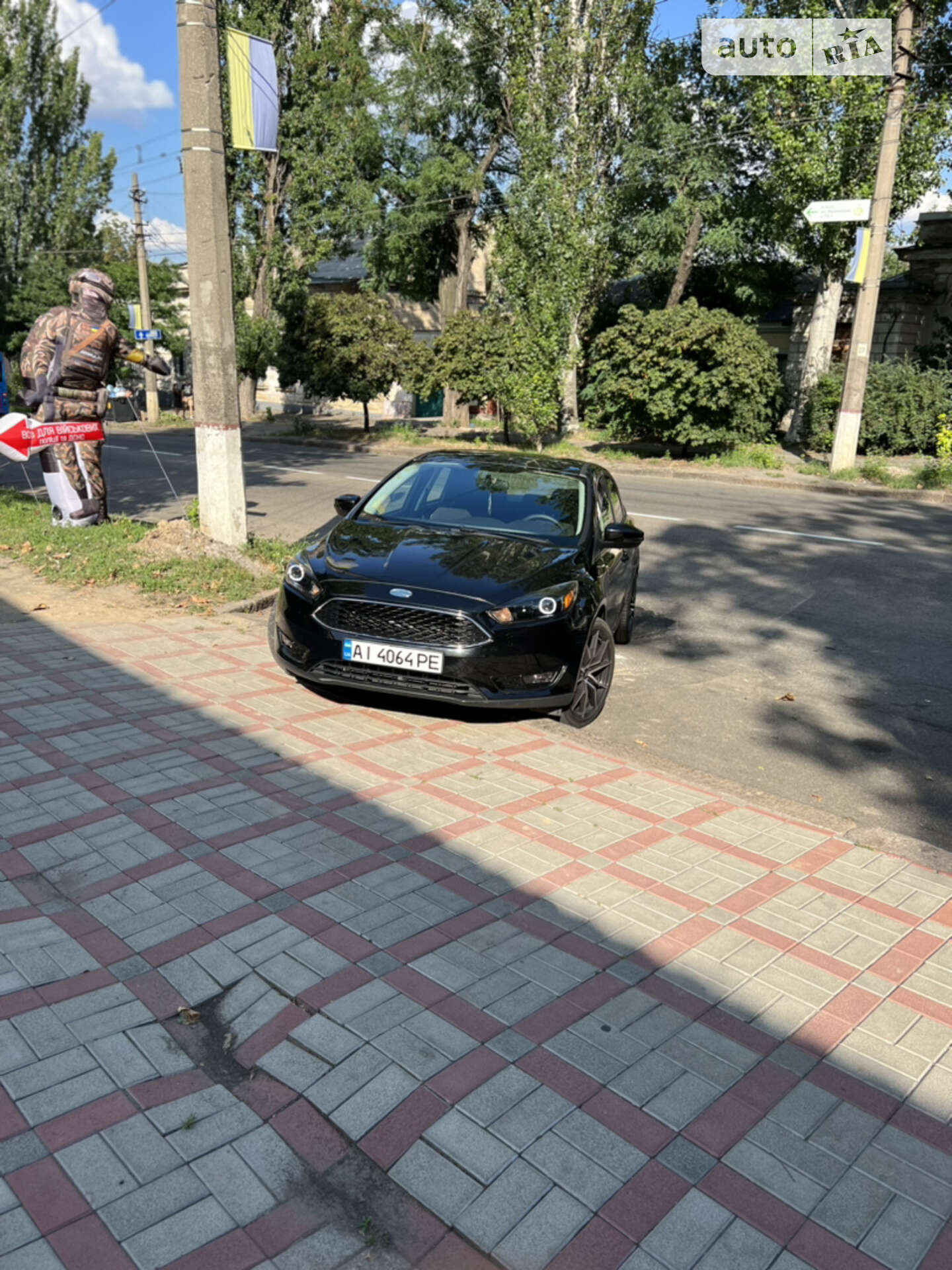Ford Focus 2015 VIN 1FADP3F20FL306426 фото оголошення 7 з 18