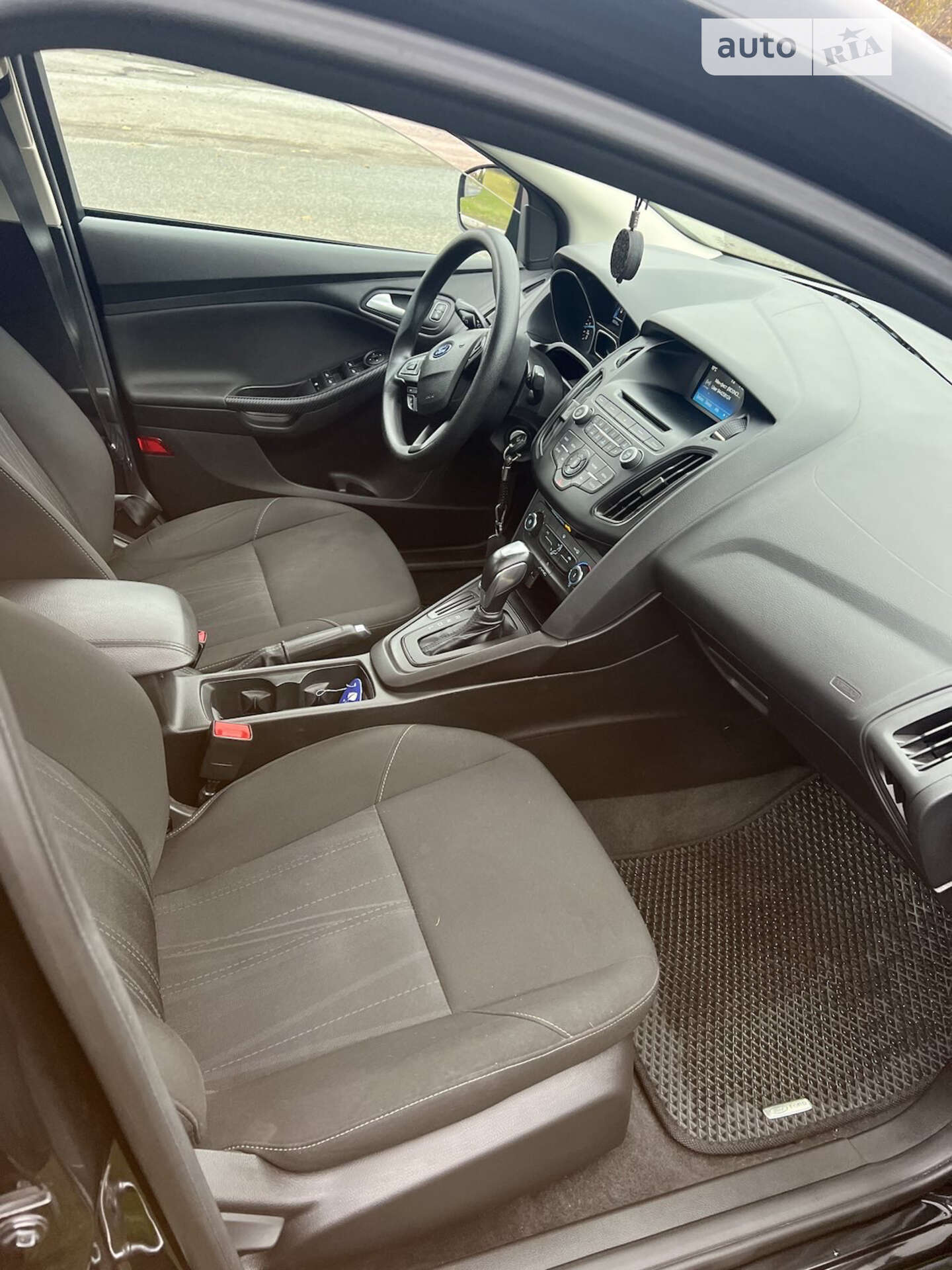 Ford Focus 2015 VIN 1FADP3F20FL306426 фото оголошення 9 з 18