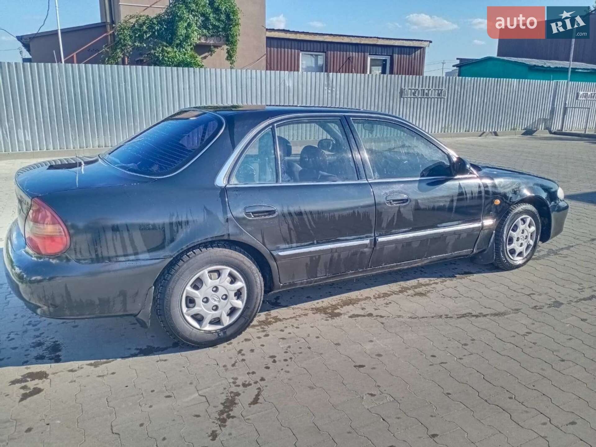 Hyundai Sonata 1997 VIN KMHCF31FPVU773820 фото оголошення 12 з 13