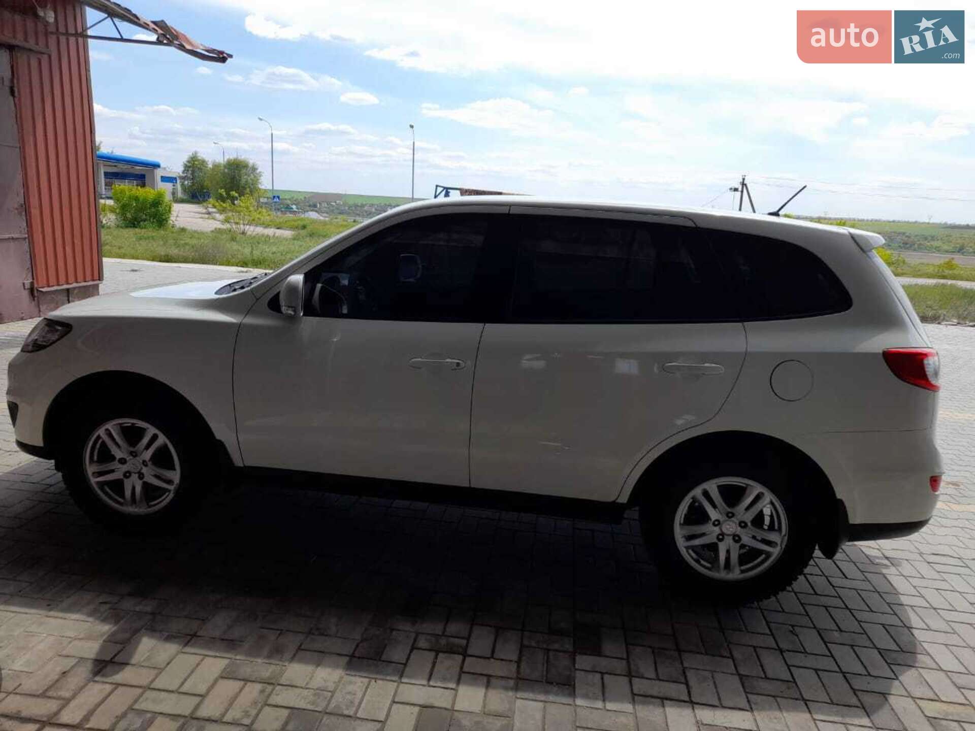 Hyundai Santa FE 2010 VIN KMHSG81XCAU629084 фото оголошення 2 з 12
