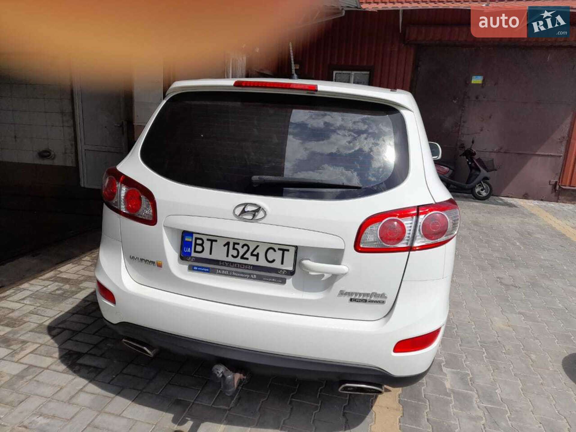 Hyundai Santa FE 2010 VIN KMHSG81XCAU629084 фото оголошення 4 з 12