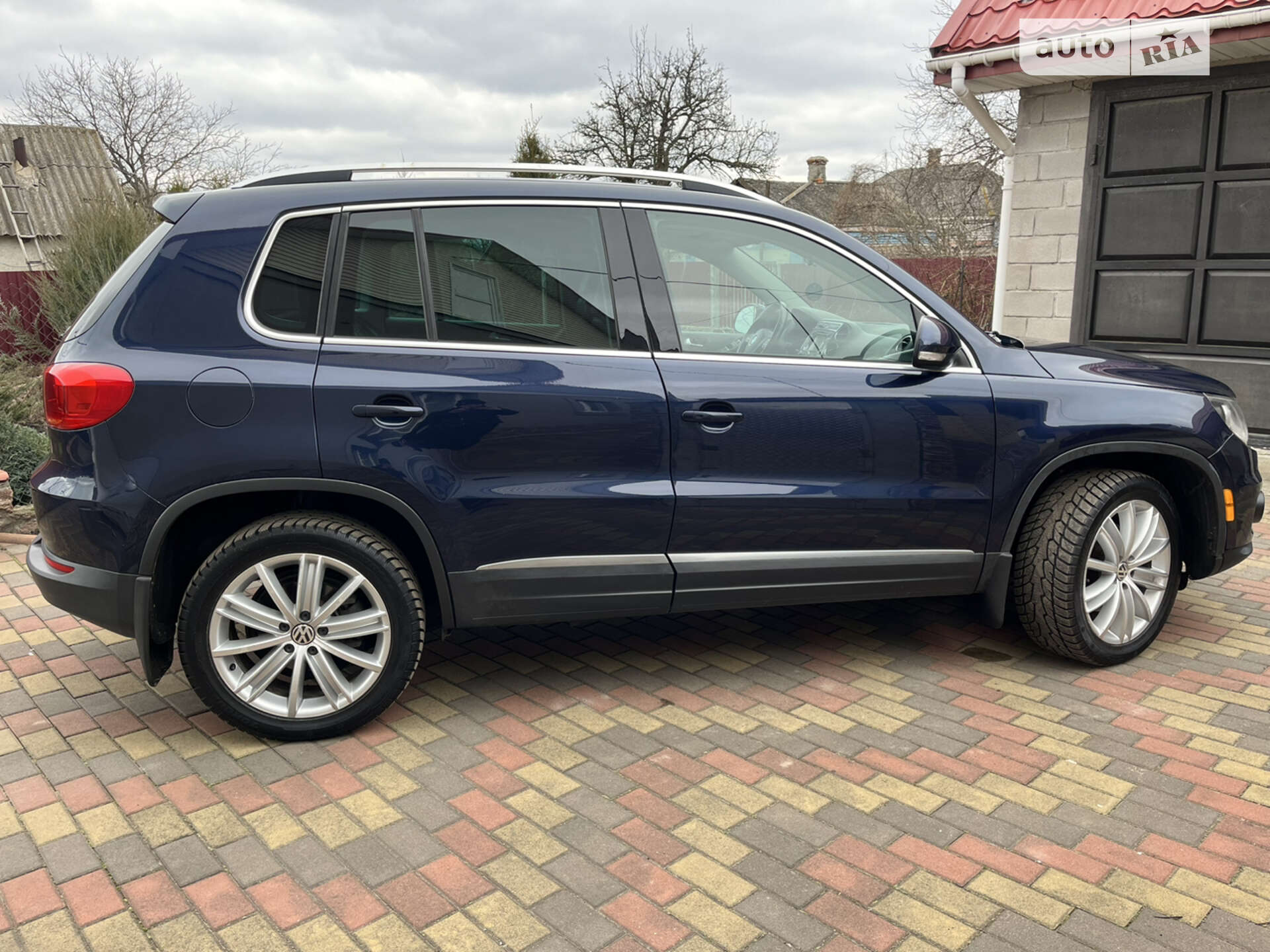 Volkswagen Tiguan 2015 VIN WVGAV7AX0FW569197 фото оголошення 2 з 29