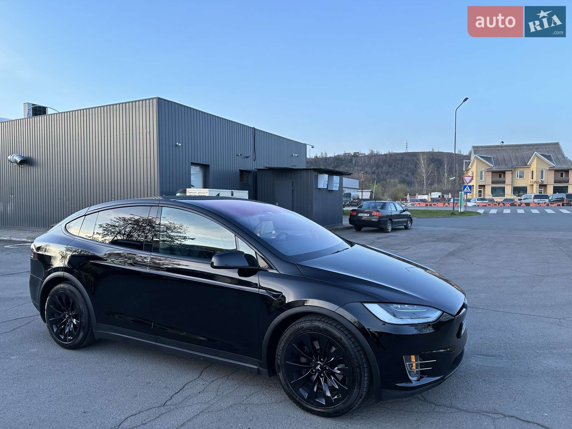 Tesla Model X 2018 VIN 5YJXCAE20JF123581 фото оголошення 2 з 26