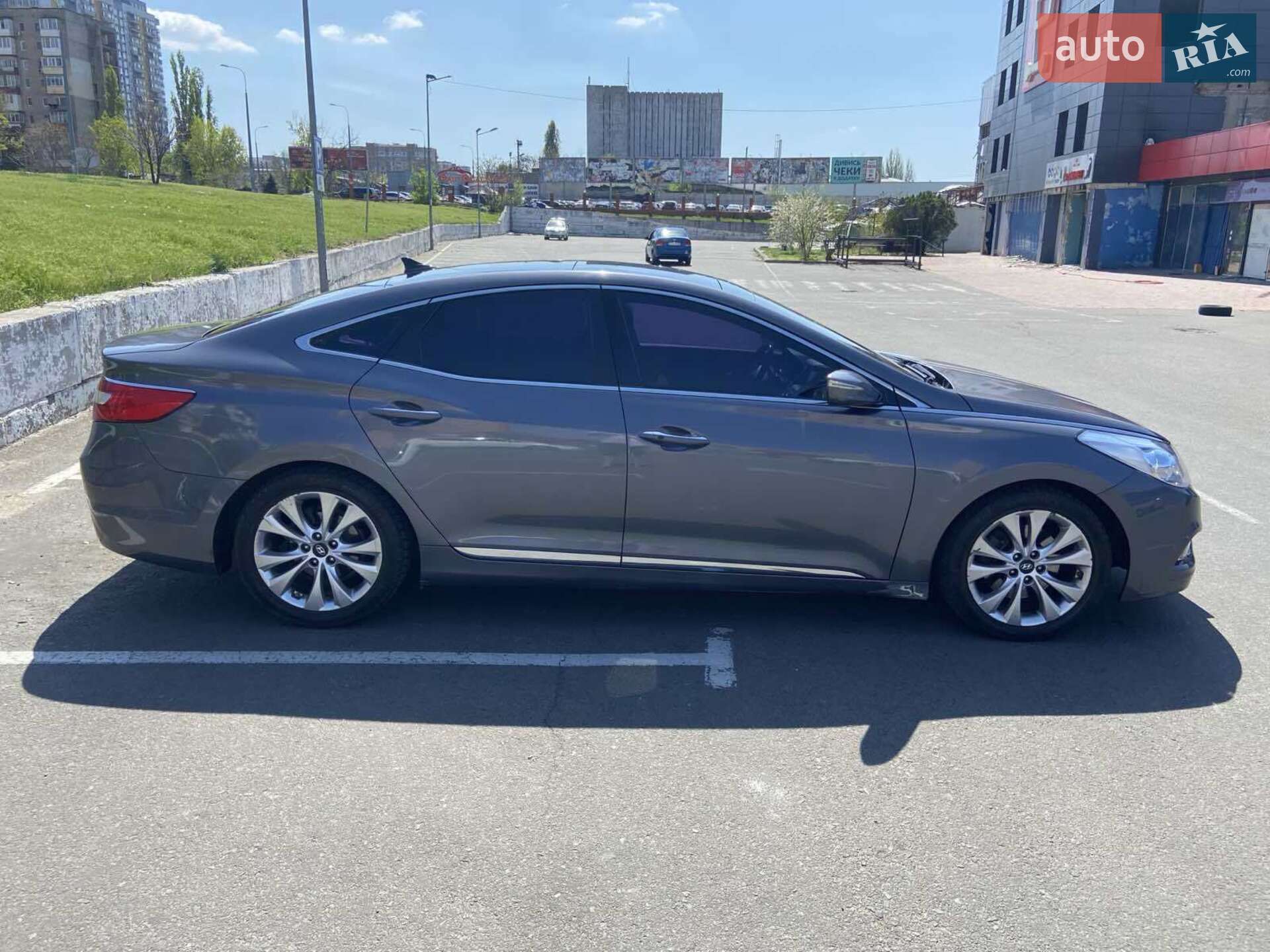 Hyundai Grandeur 2012 VIN KMHFH41NBCA144075 фото оголошення 7 з 28