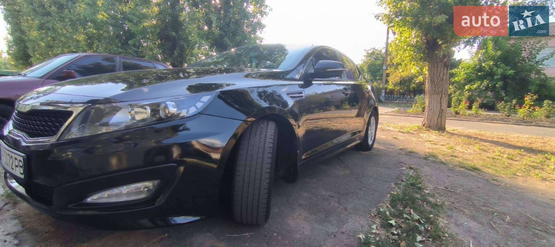 Kia K5 2013 VIN KNAGN418BDA396037 фото оголошення 6 з 19