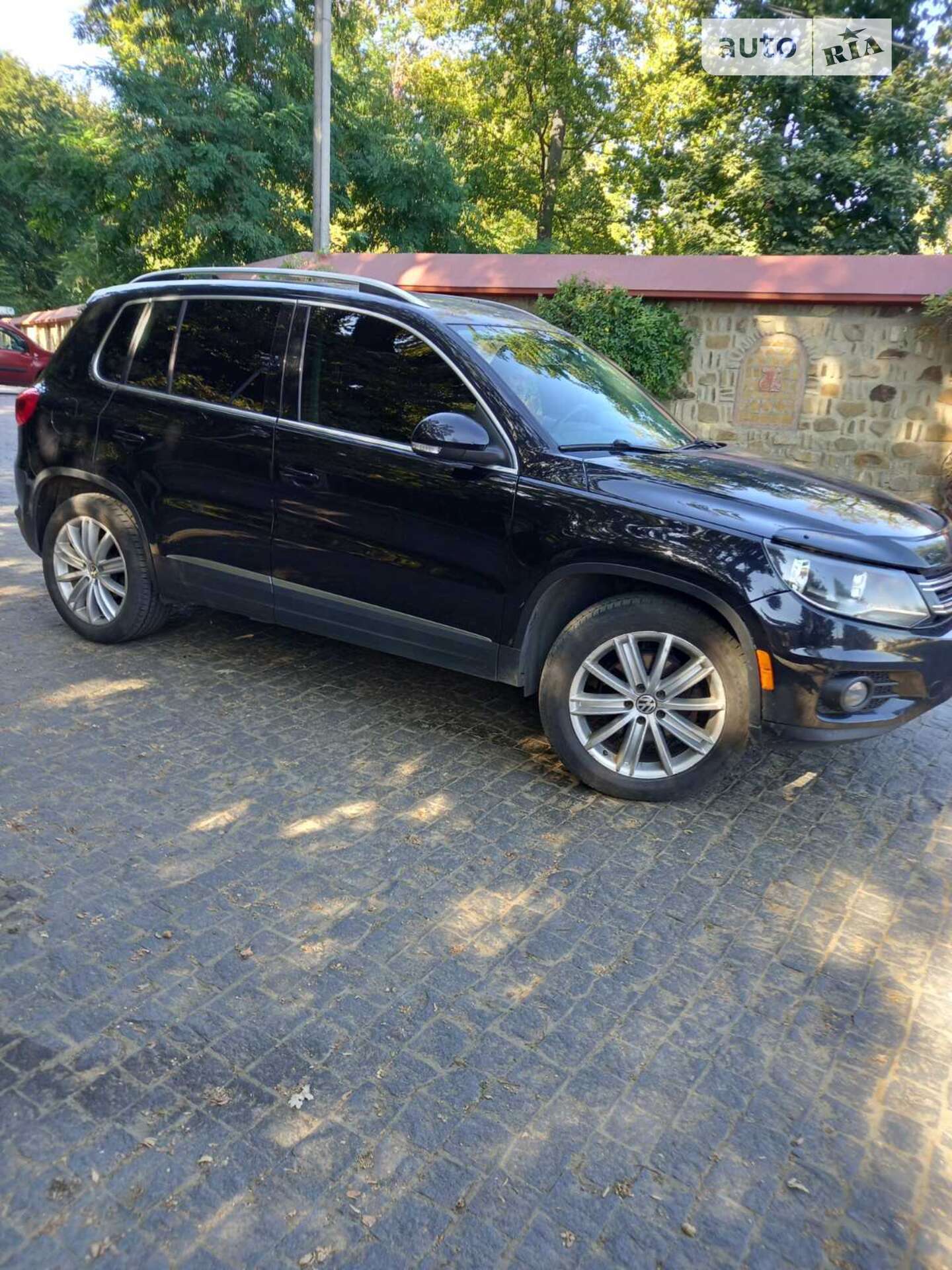 Volkswagen Tiguan 2013 VIN WVGBV3AX4EW554312 фото оголошення 8 з 42