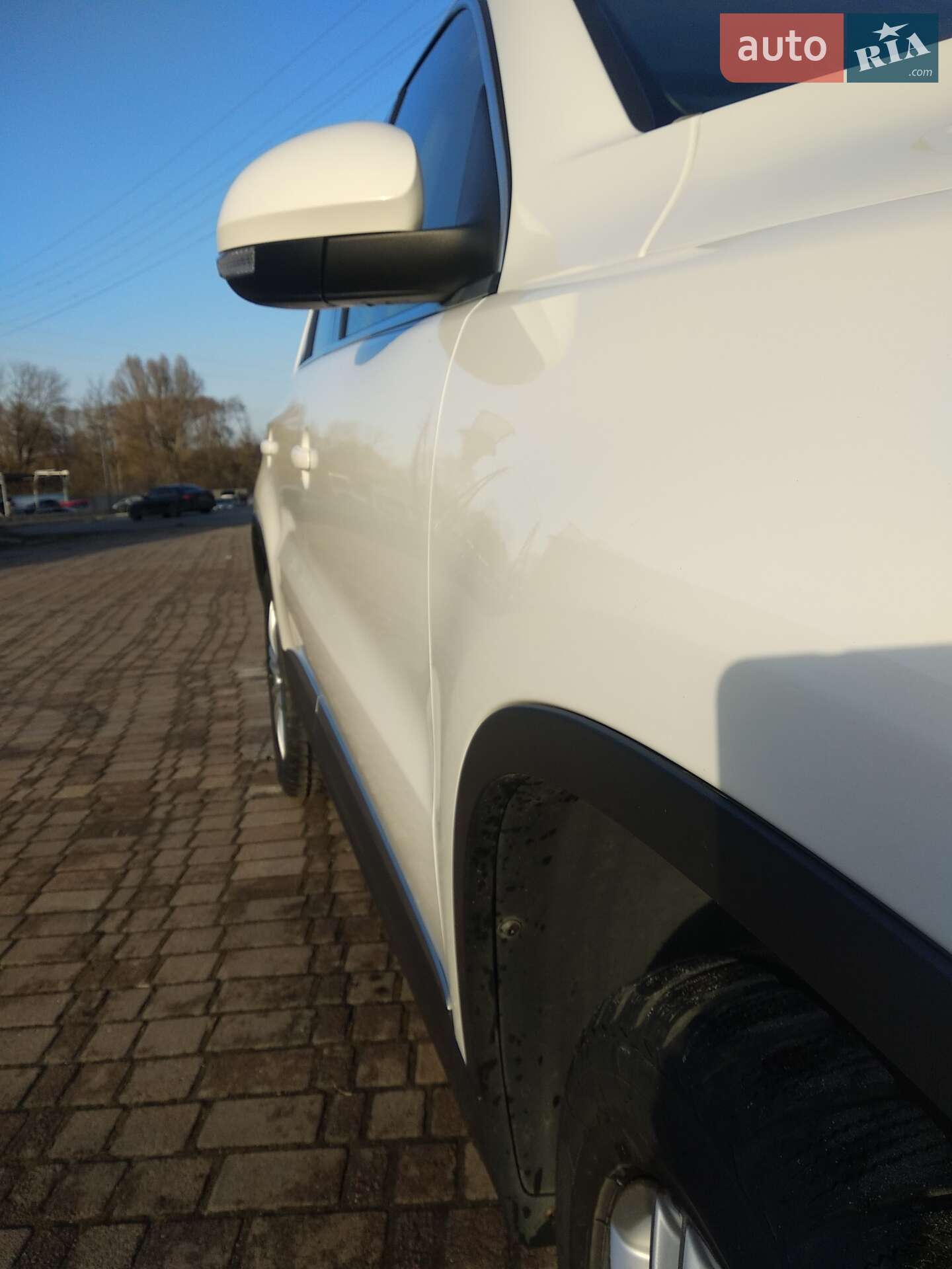 Volkswagen Tiguan 2012 VIN WVGAV3AX1DW570199 фото оголошення 7 з 8
