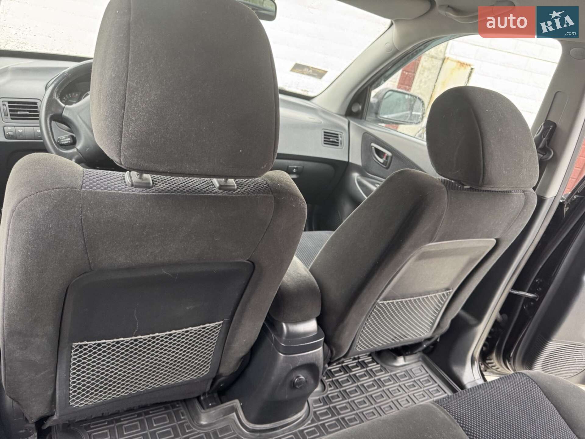 Hyundai Tucson 2009 VIN KMHJN81BP9U056499 фото оголошення 11 з 20