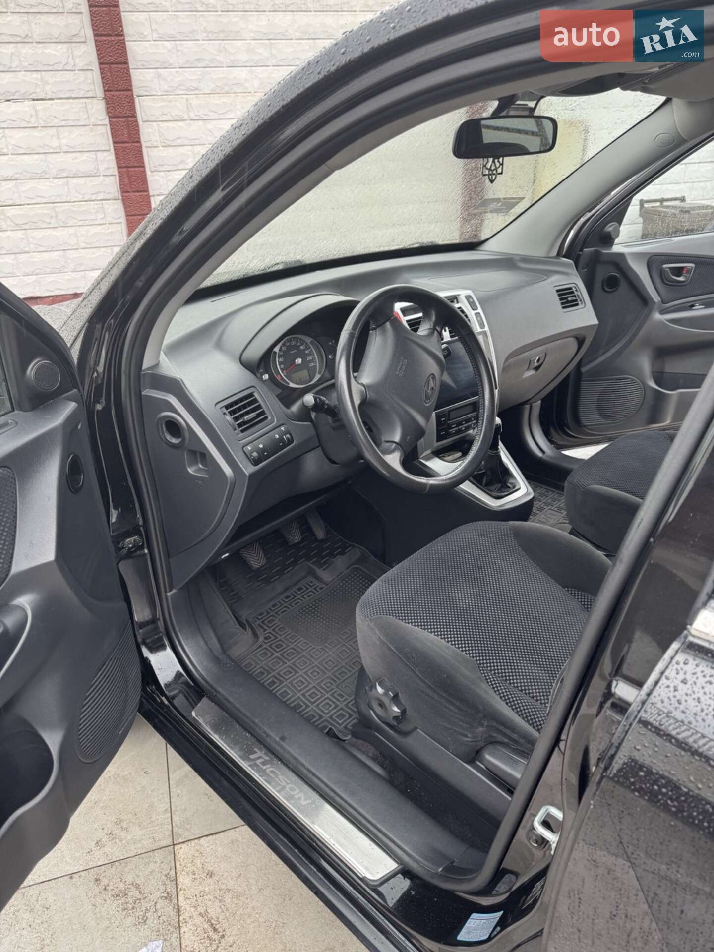 Hyundai Tucson 2009 VIN KMHJN81BP9U056499 фото оголошення 13 з 20