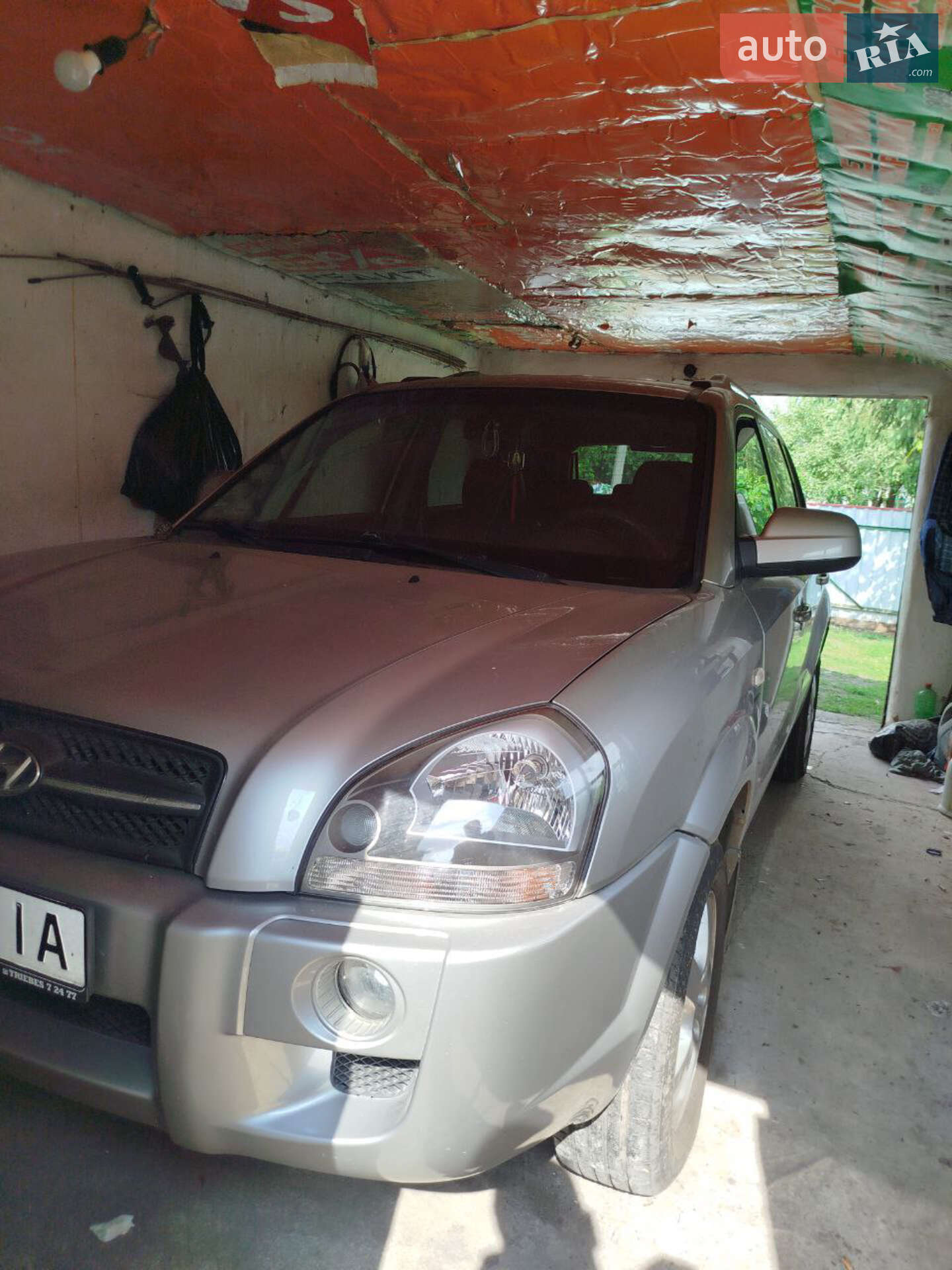 Hyundai Tucson 2005 VIN KMHJN81BP6U263591 фото оголошення 12 з 16