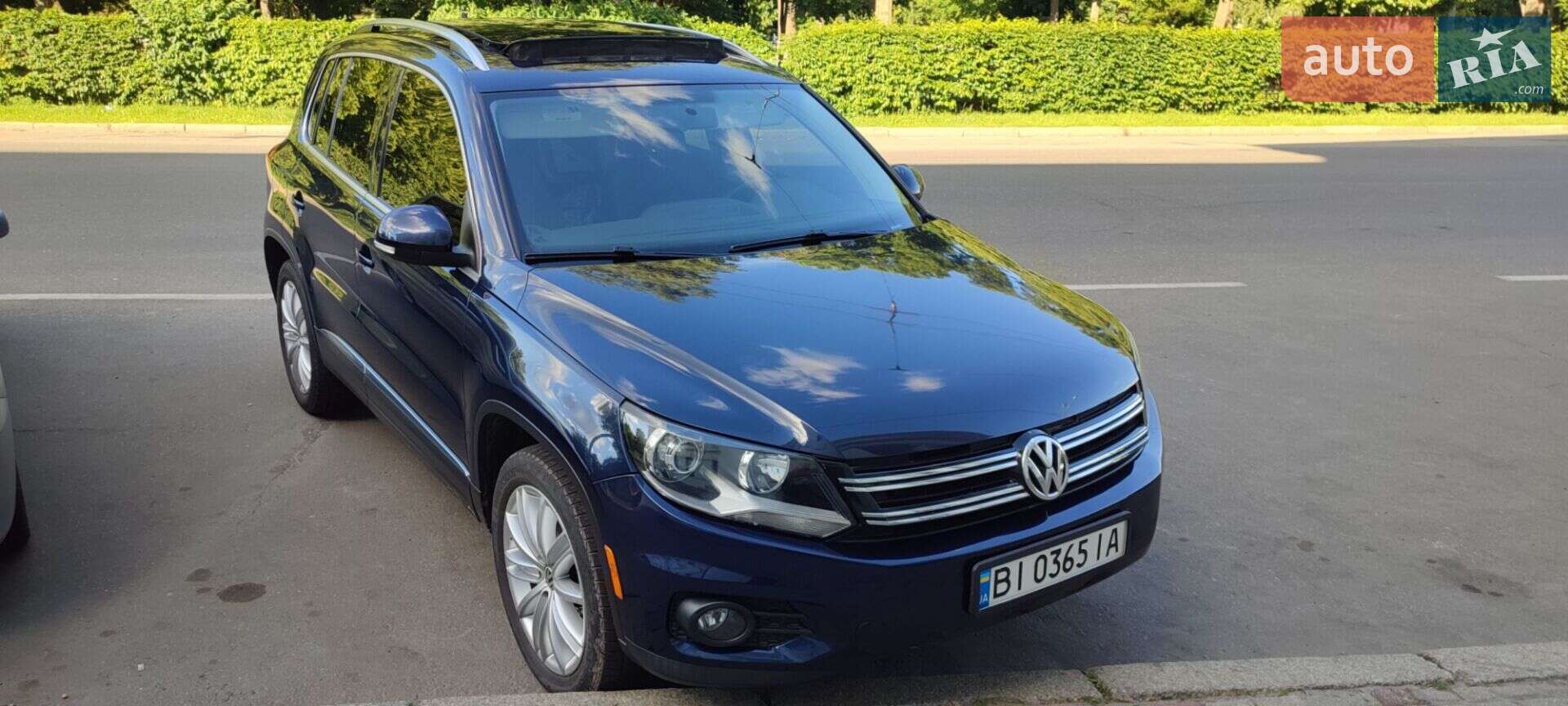 Volkswagen Tiguan 2012 VIN WVGAV7AX3DW558532 фото оголошення 4 з 31