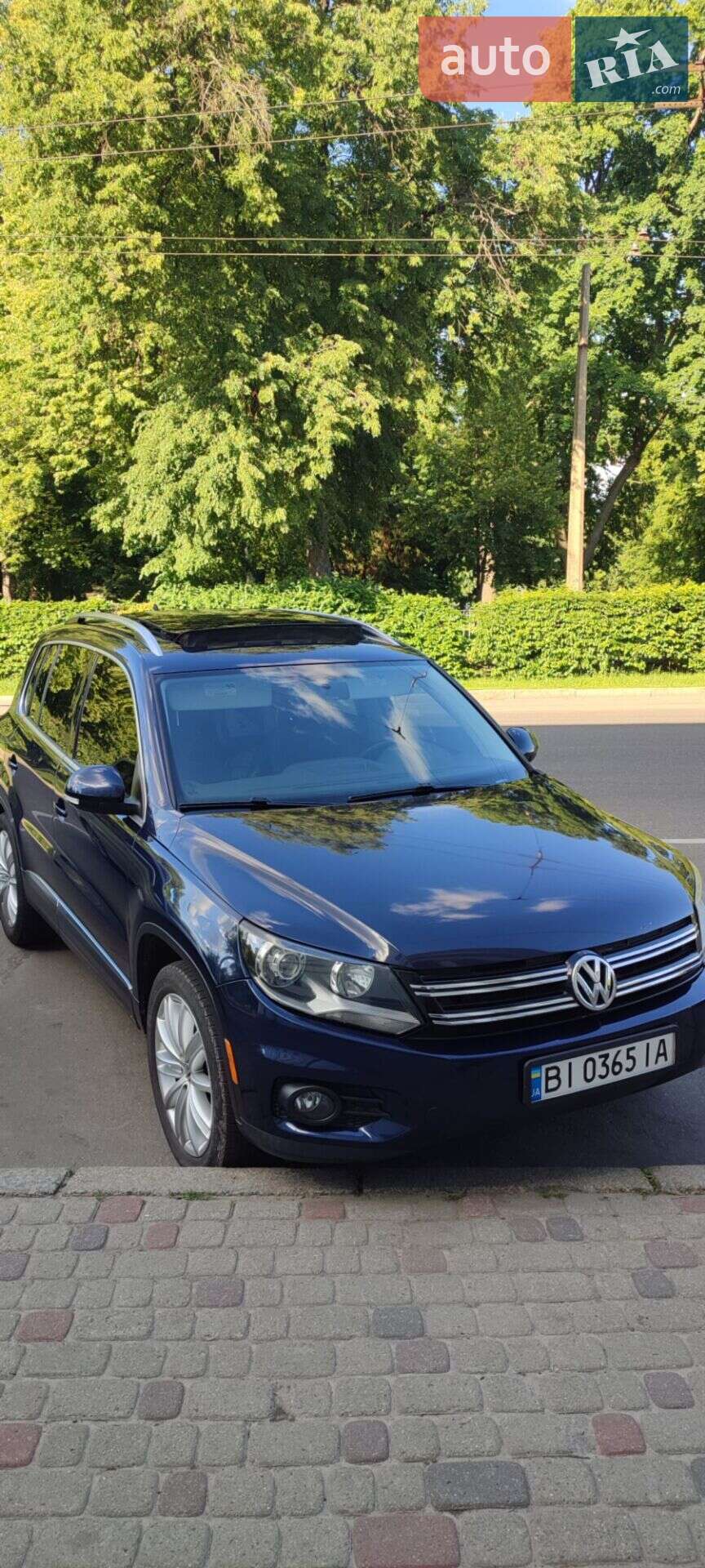 Volkswagen Tiguan 2012 VIN WVGAV7AX3DW558532 фото оголошення 5 з 31