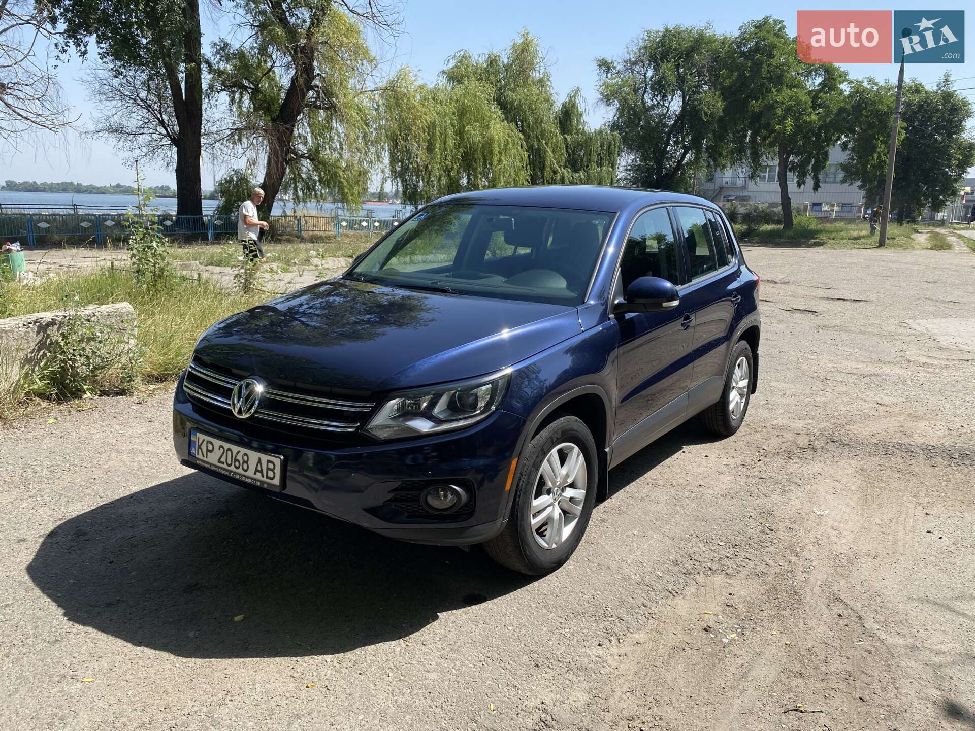 Volkswagen Tiguan 2013 VIN WVGAV3AX1EW527757 фото оголошення 4 з 13
