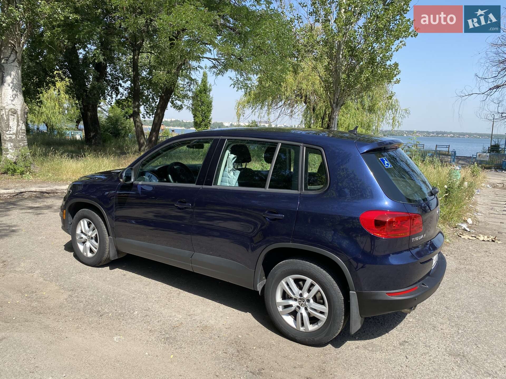 Volkswagen Tiguan 2013 VIN WVGAV3AX1EW527757 фото оголошення 5 з 13