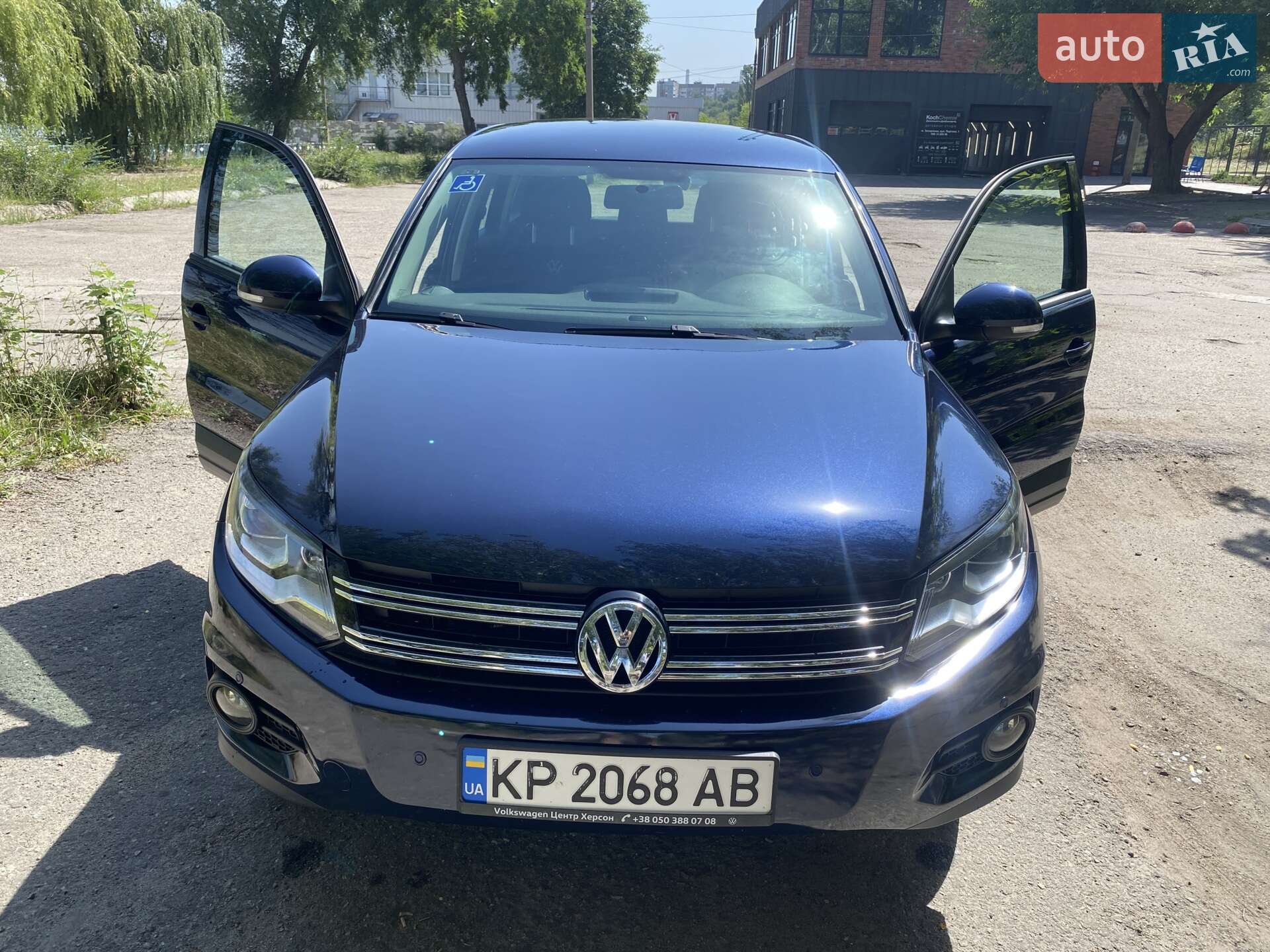Volkswagen Tiguan 2013 VIN WVGAV3AX1EW527757 фото оголошення 9 з 13