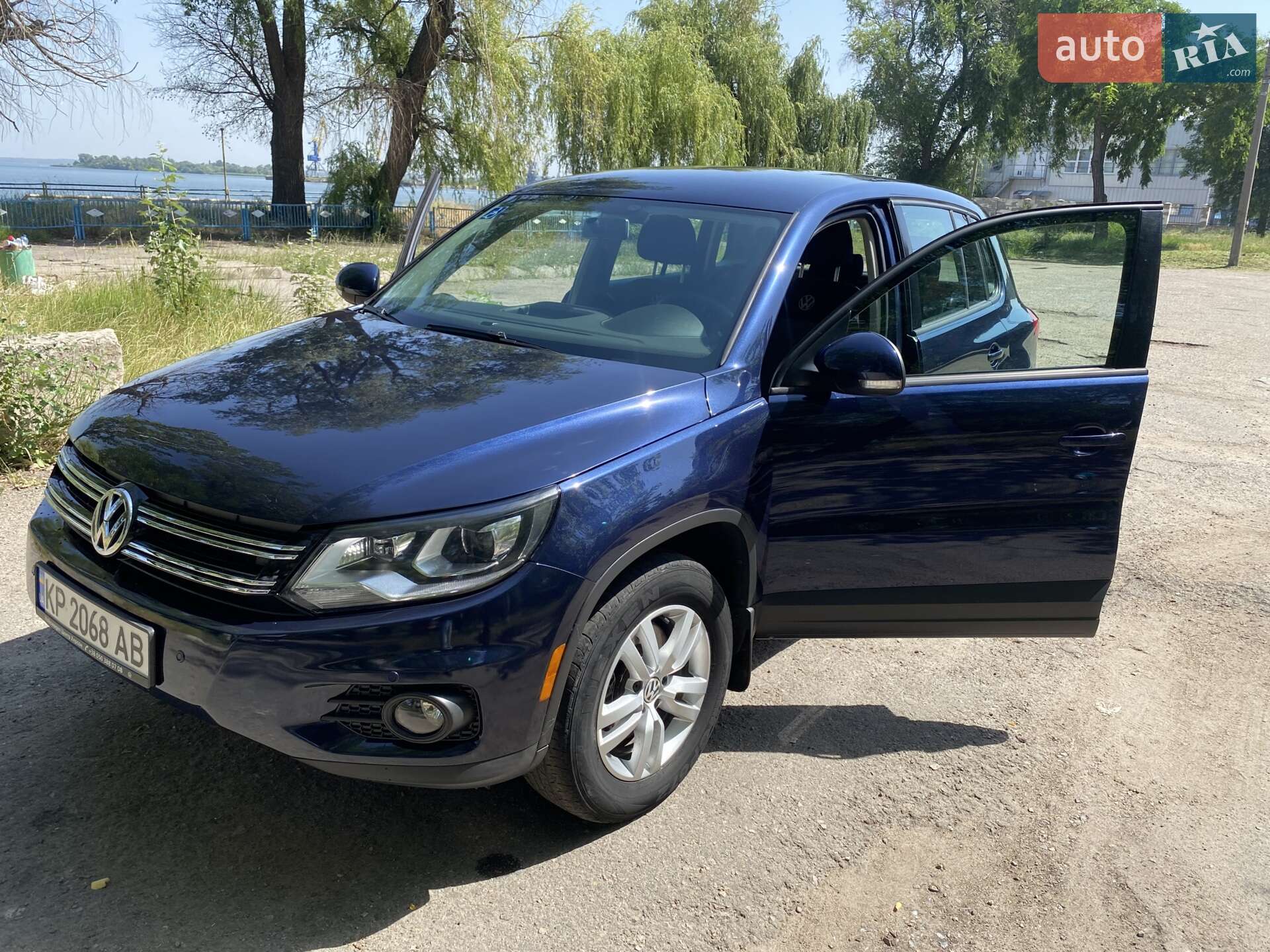 Volkswagen Tiguan 2013 VIN WVGAV3AX1EW527757 фото оголошення 3 з 13
