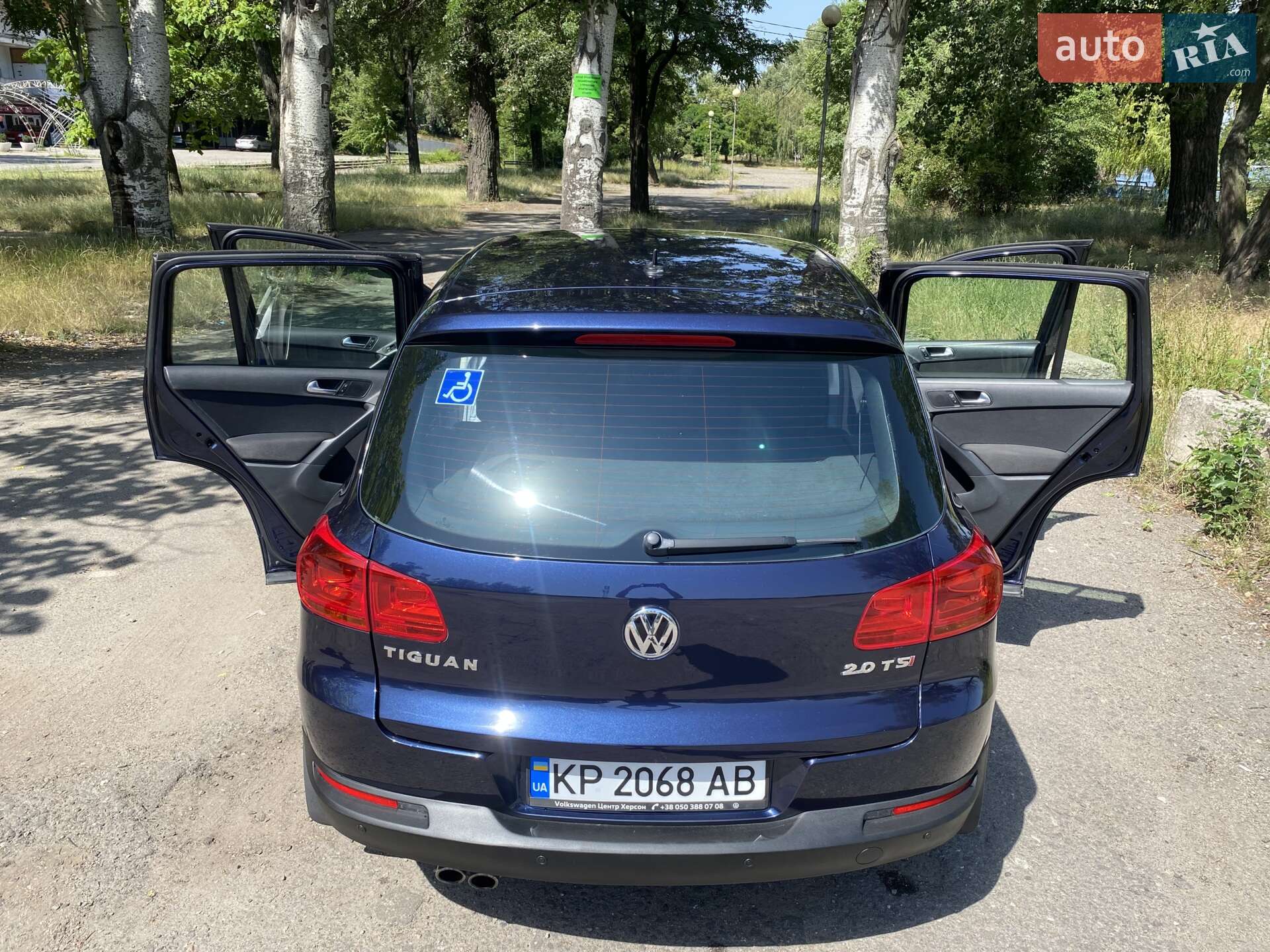 Volkswagen Tiguan 2013 VIN WVGAV3AX1EW527757 фото оголошення 11 з 13