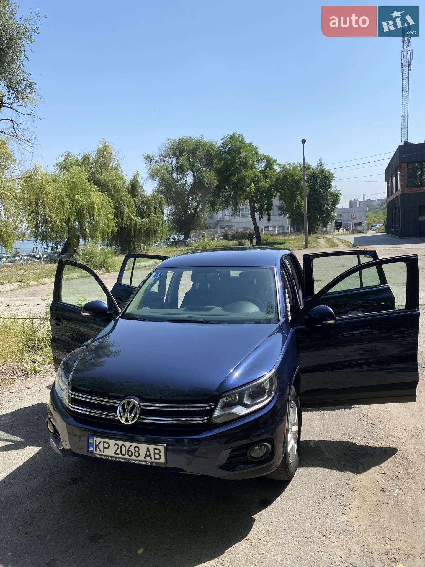 Volkswagen Tiguan 2013 VIN WVGAV3AX1EW527757 фото оголошення 12 з 13