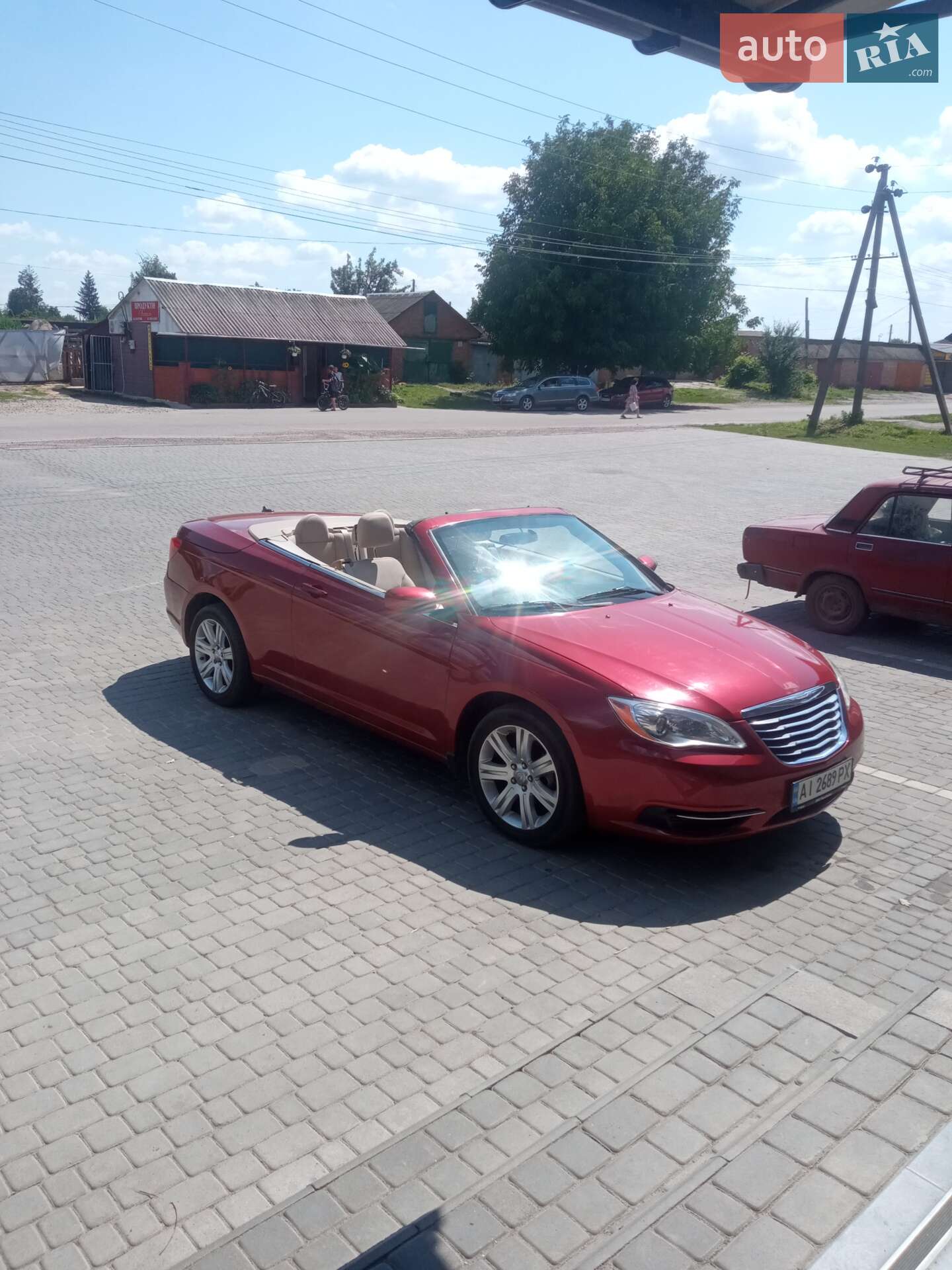 Chrysler 200 2011 VIN 1C3BCBEB5CN146640 фото оголошення 4 з 10