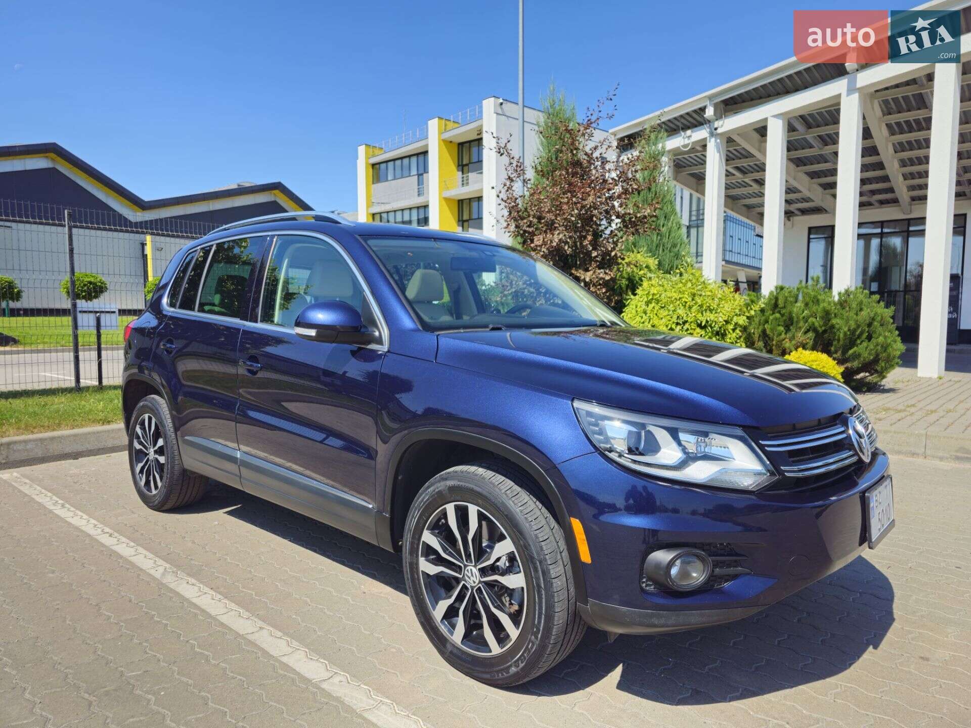 Volkswagen Tiguan 2011 VIN WVGAV7AXXCW528443 фото оголошення 2 з 41