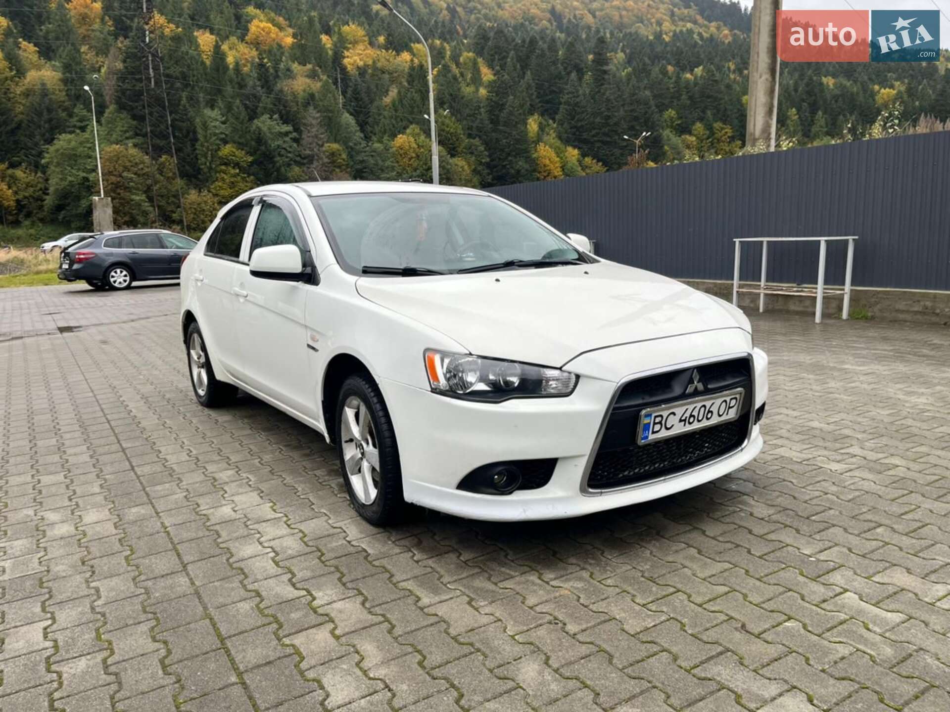 Mitsubishi Lancer 2011 VIN JMBLJCX9ABU002259 фото оголошення 7 з 9