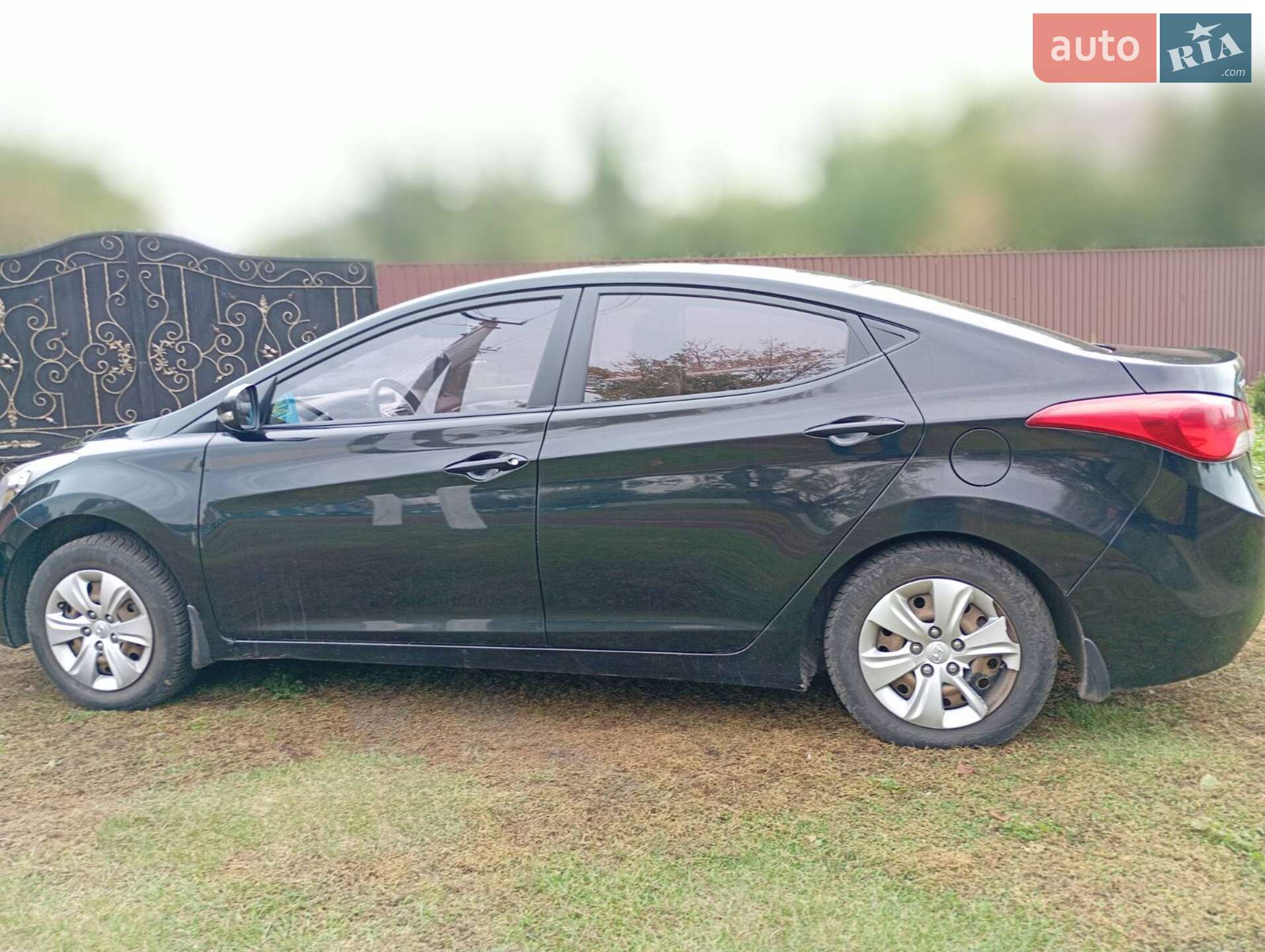 Hyundai Elantra 2011 VIN KMHDH41CACU301102 фото оголошення 8 з 11