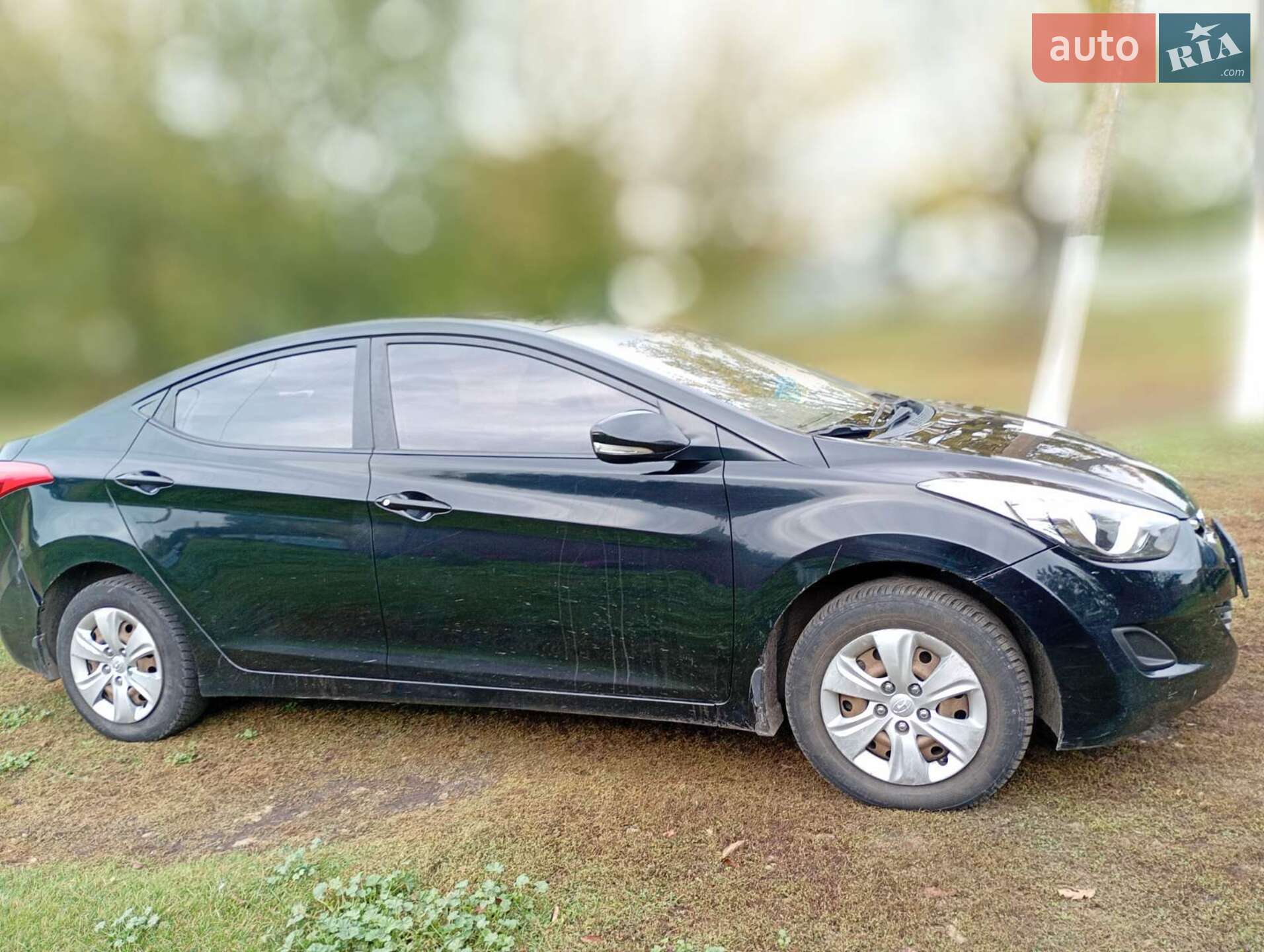 Hyundai Elantra 2011 VIN KMHDH41CACU301102 фото оголошення 10 з 11