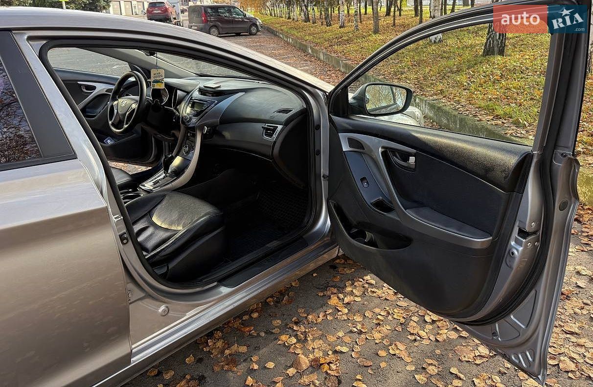 Hyundai Elantra 2012 VIN KMHDH41EBCU681956 фото оголошення 12 з 20