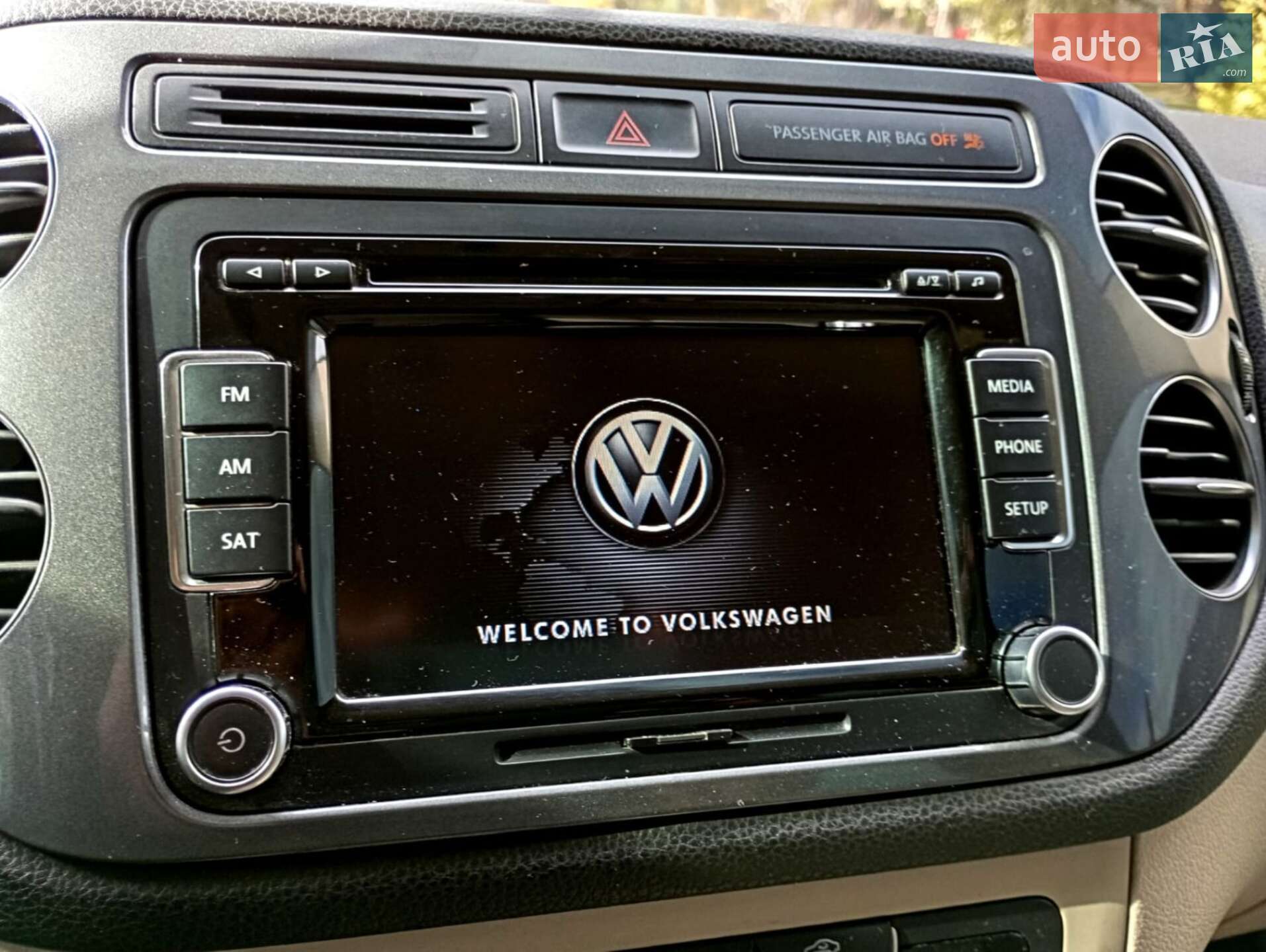 Volkswagen Tiguan 2012 VIN WVGAV7AX3CW605928 фото оголошення 7 з 12