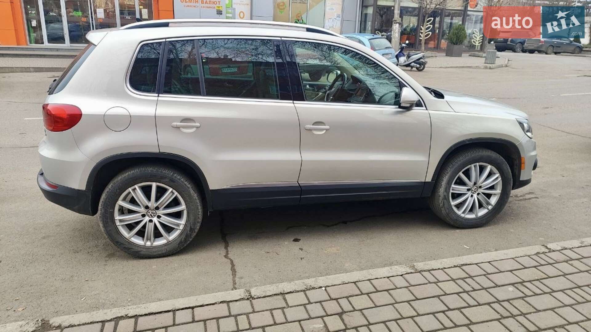 Volkswagen Tiguan 2013 VIN WVGBV3AX9DW592049 фото оголошення 2 з 12