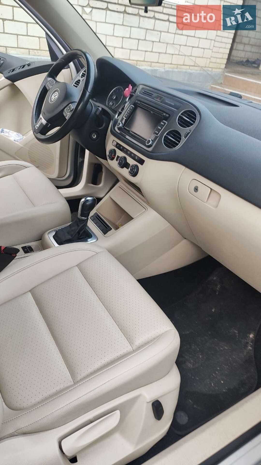 Volkswagen Tiguan 2013 VIN WVGBV3AX9DW592049 фото оголошення 9 з 12