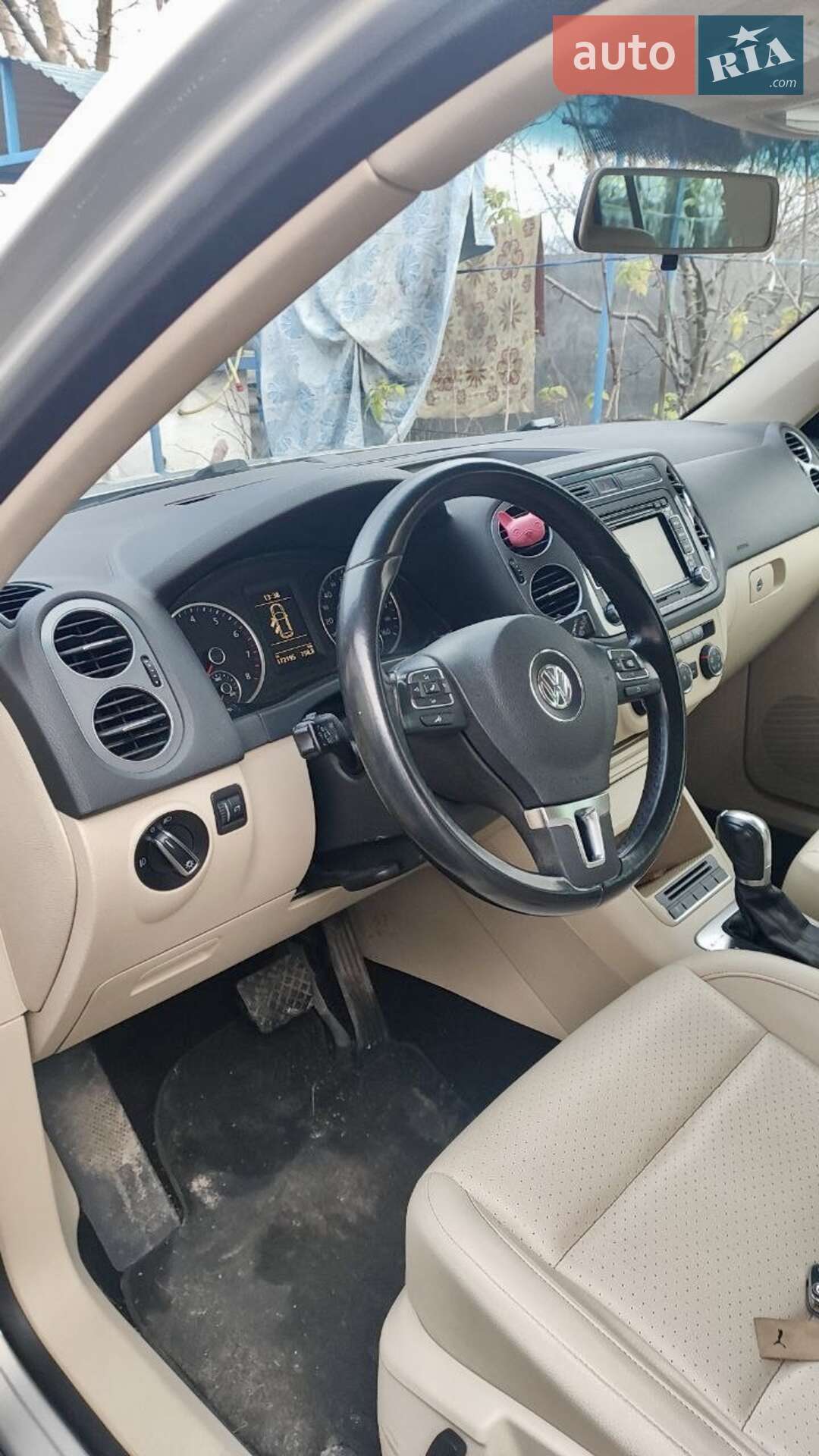 Volkswagen Tiguan 2013 VIN WVGBV3AX9DW592049 фото оголошення 11 з 12