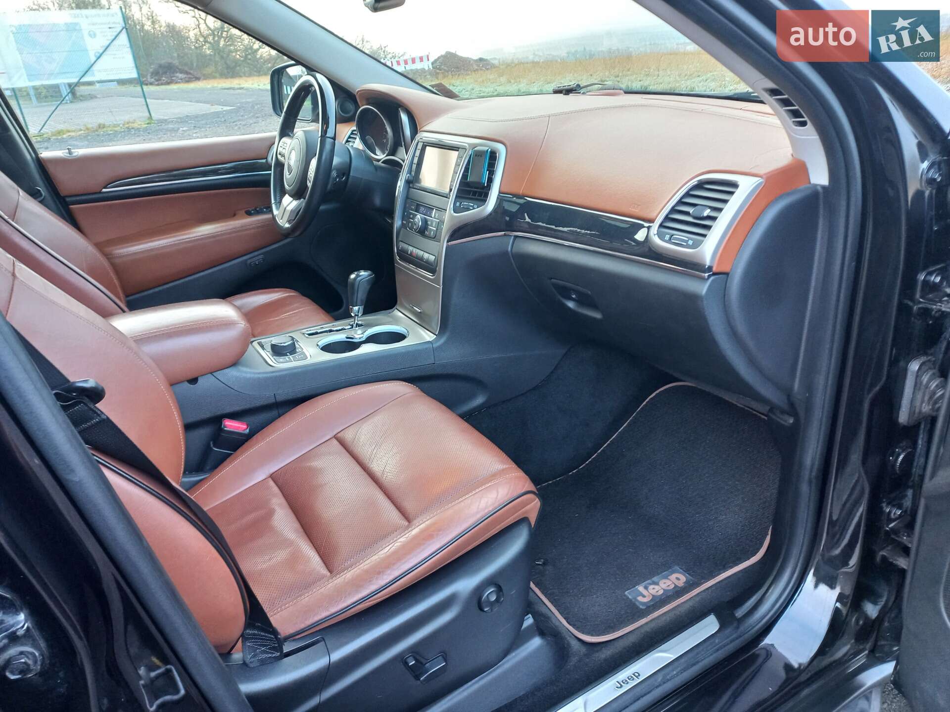 Jeep Grand Cherokee 2012 VIN 1C4RJFCM0CC340418 фото оголошення 13 з 19
