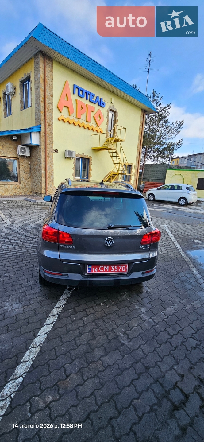 Volkswagen Tiguan 2014 VIN WVGBV7AXXFW503955 фото оголошення 10 з 37