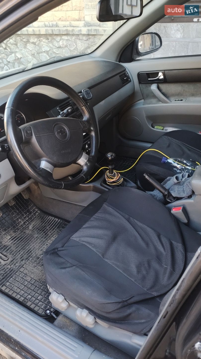 Chevrolet Lacetti 2012 VIN KL1NF19B1CK783677 фото оголошення 13 з 18