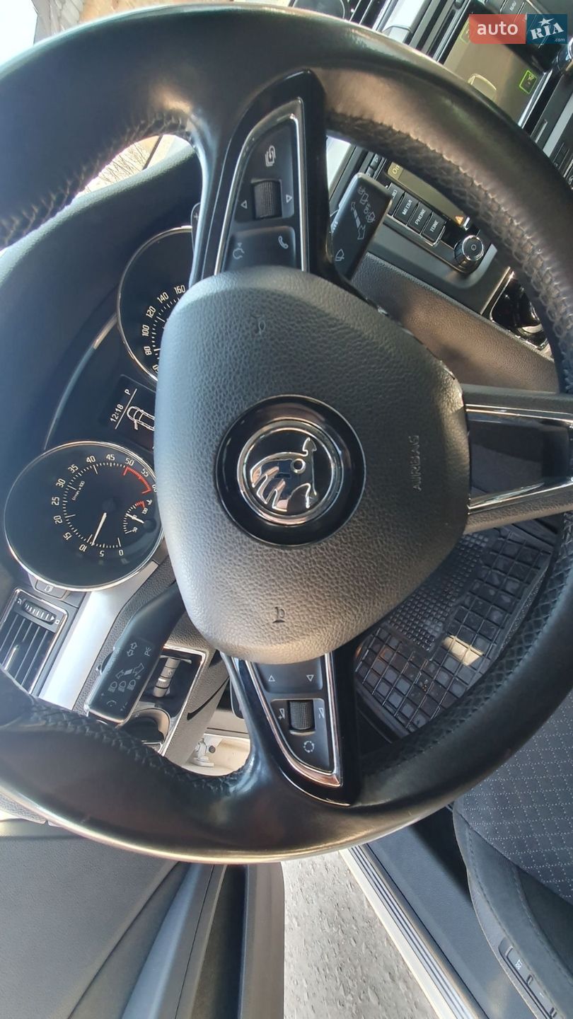 Skoda Superb 2013 VIN TMBLF73T7E9025796 фото оголошення 8 з 10