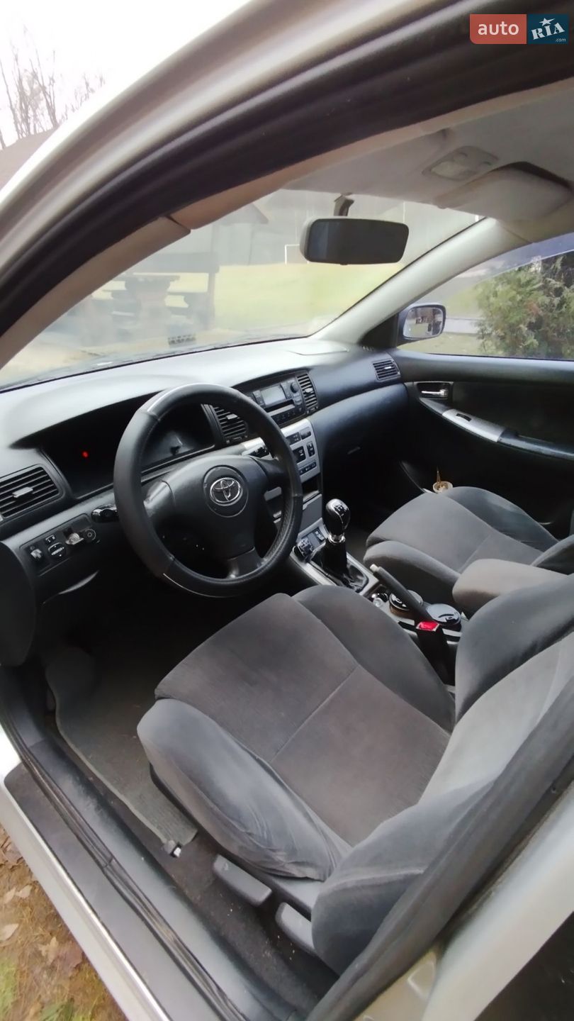 Toyota Corolla 2004 VIN NMTBZ28EX0R075052 фото оголошення 11 з 19
