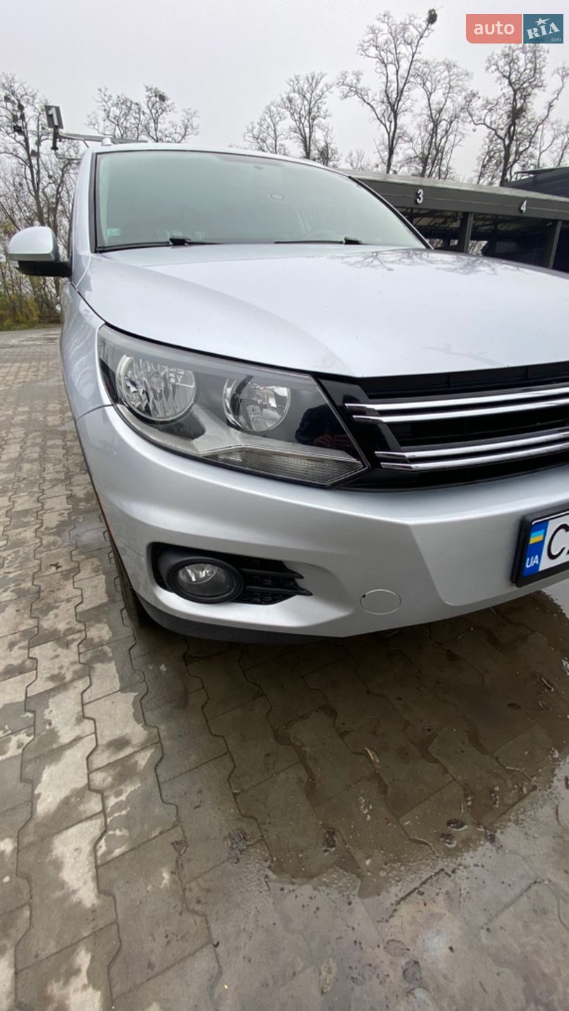 Volkswagen Tiguan 2011 VIN WVGAV7AX8CW527811 фото оголошення 3 з 31