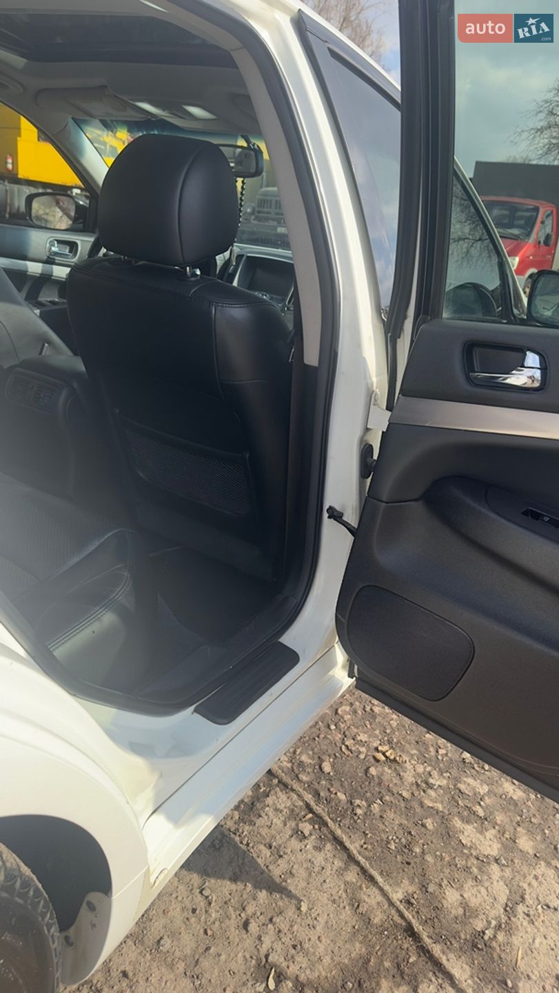 Infiniti G25 2012 VIN JN1DV6AP8CM812874 фото оголошення 10 з 19