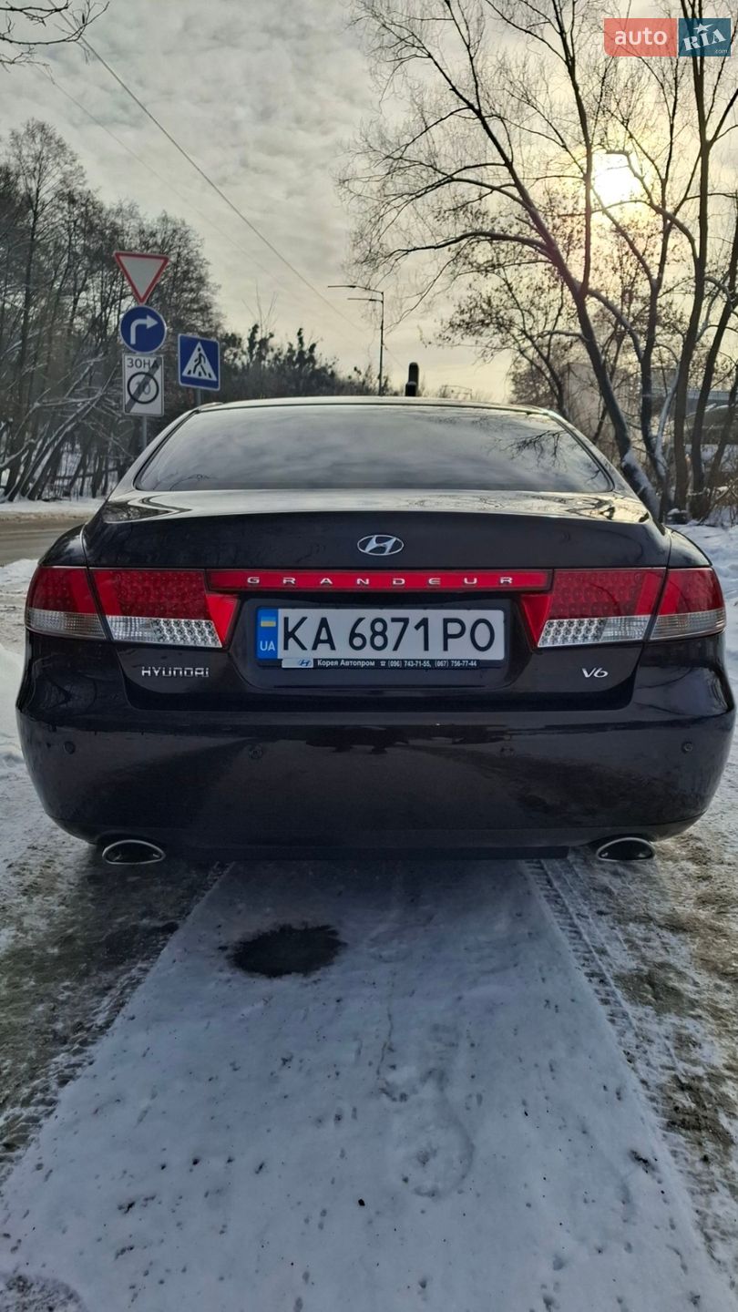 Hyundai Grandeur 2007 VIN KMHFC41DP7A220580 фото оголошення 13 з 15