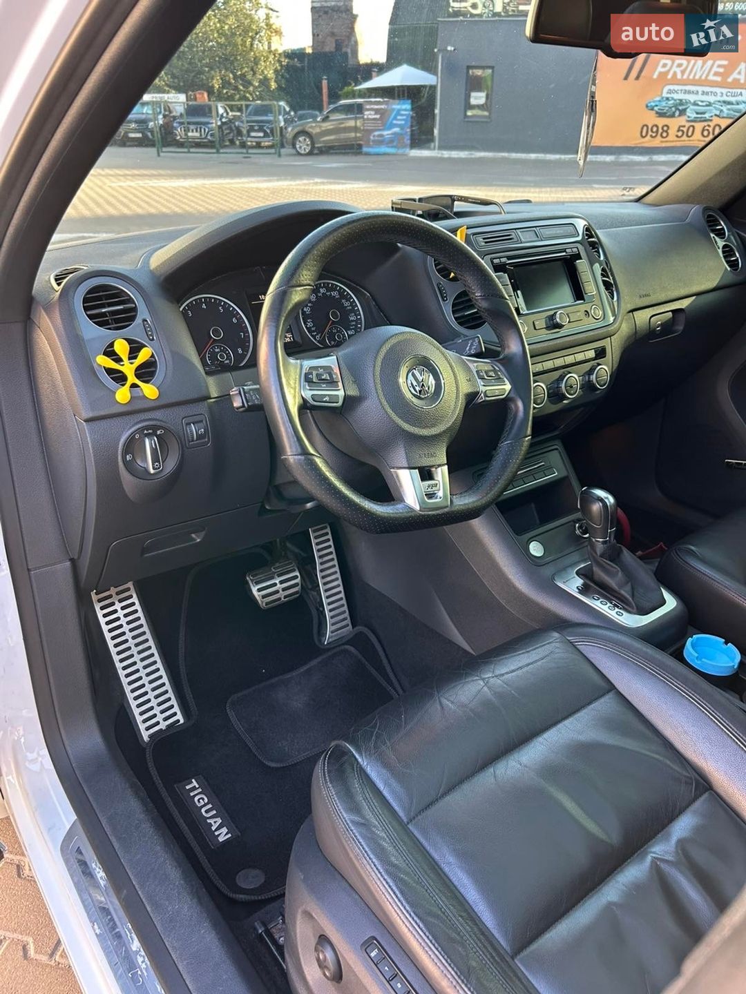 Volkswagen Tiguan 2013 VIN WVGBV3AX4EW028813 фото оголошення 12 з 15