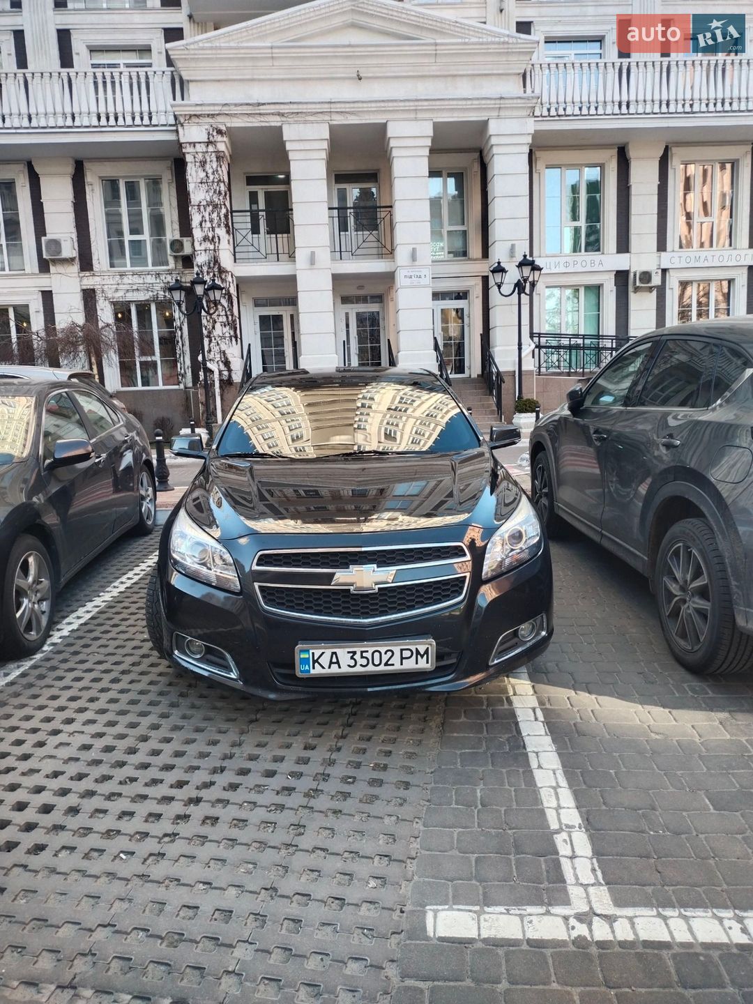 Chevrolet Malibu 2014 VIN KLAGA69ADFB026175 фото оголошення 7 з 10