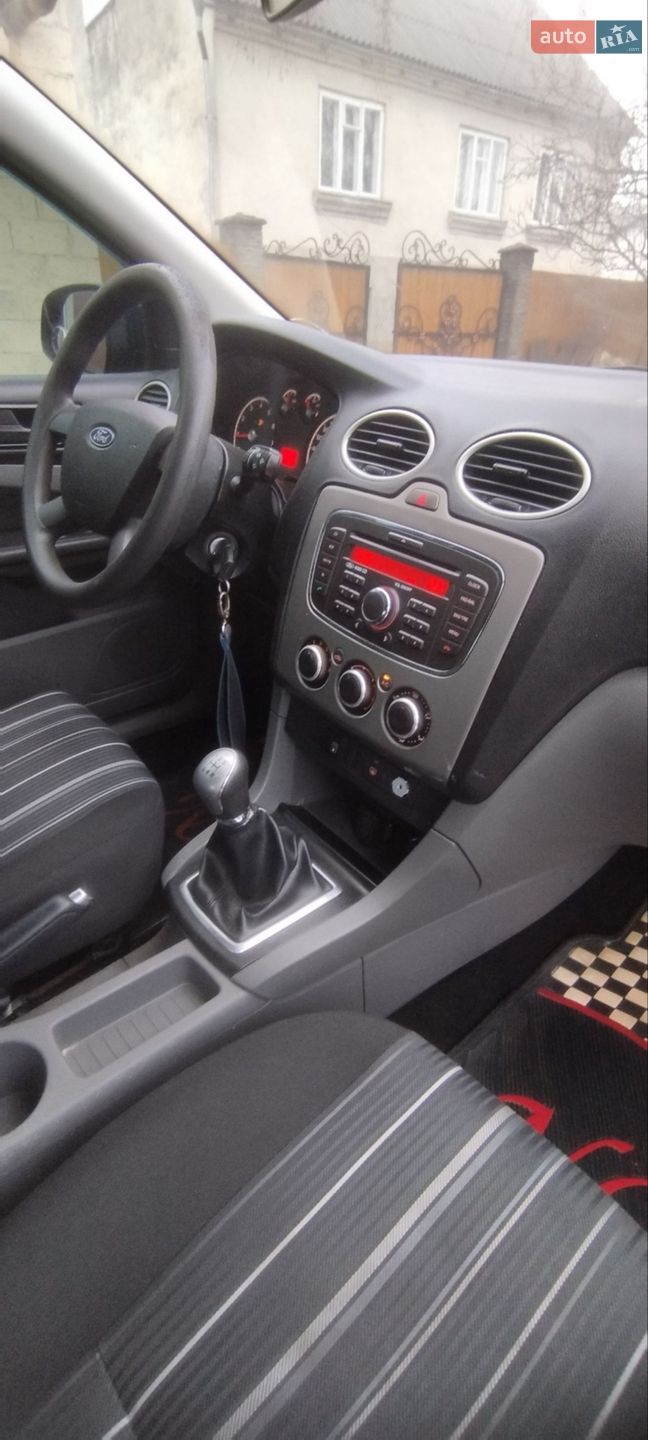 Ford Focus 2010 VIN WF0PXXGCDPAA86432 фото оголошення 9 з 18