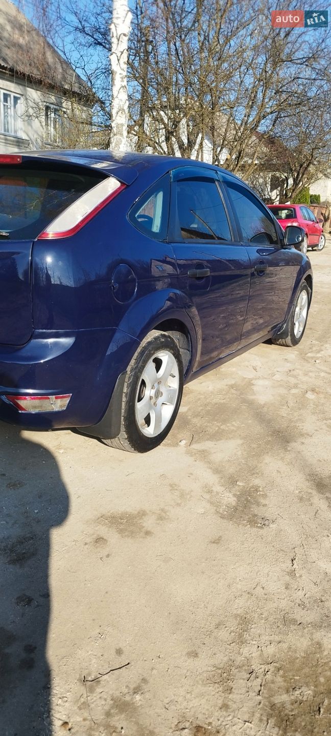 Ford Focus 2010 VIN WF0PXXGCDPAA86432 фото оголошення 8 з 27
