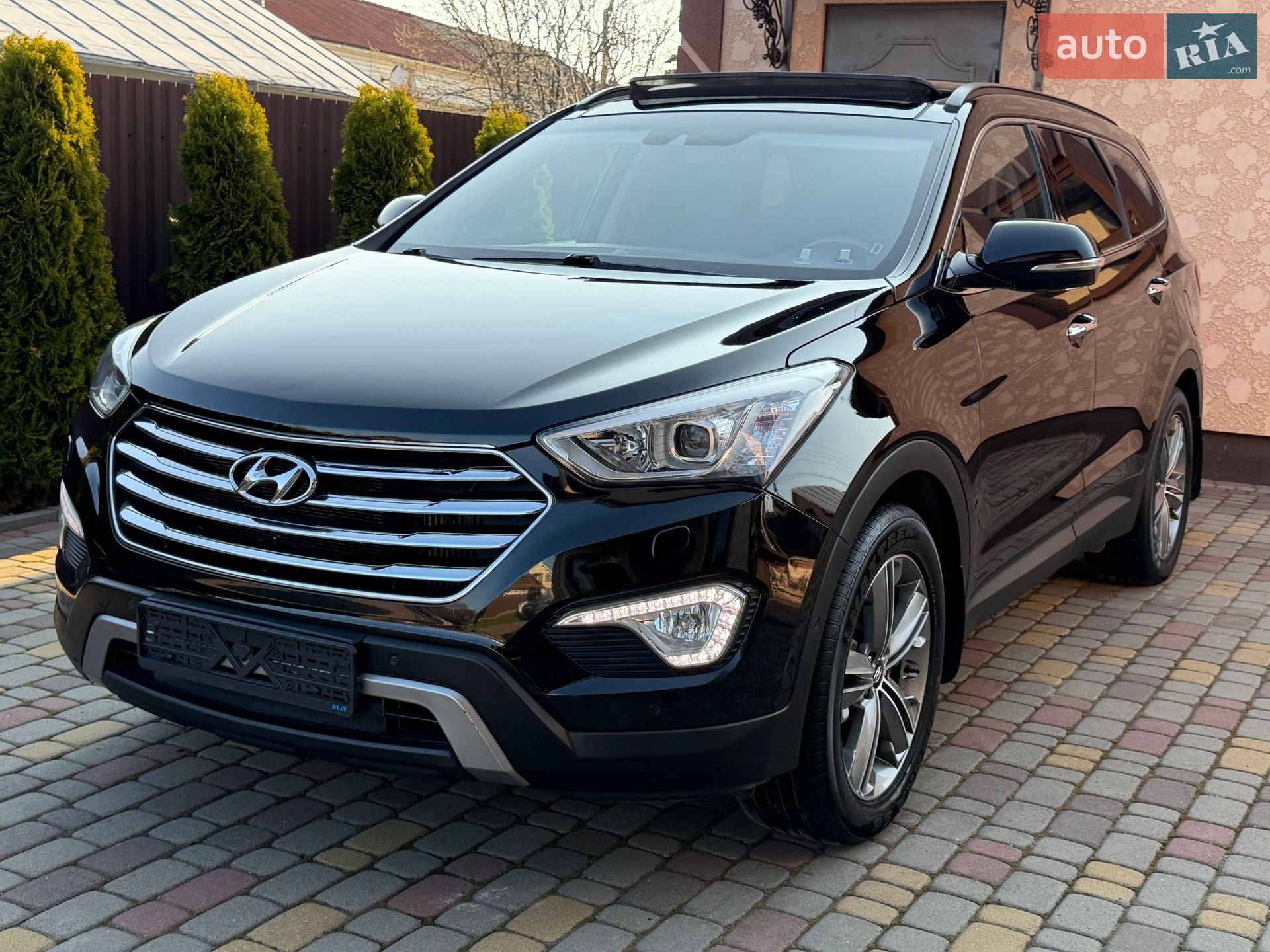 Hyundai Grand Santa Fe 2014 VIN KMHSN81XDEU077067 фото оголошення 4 з 131